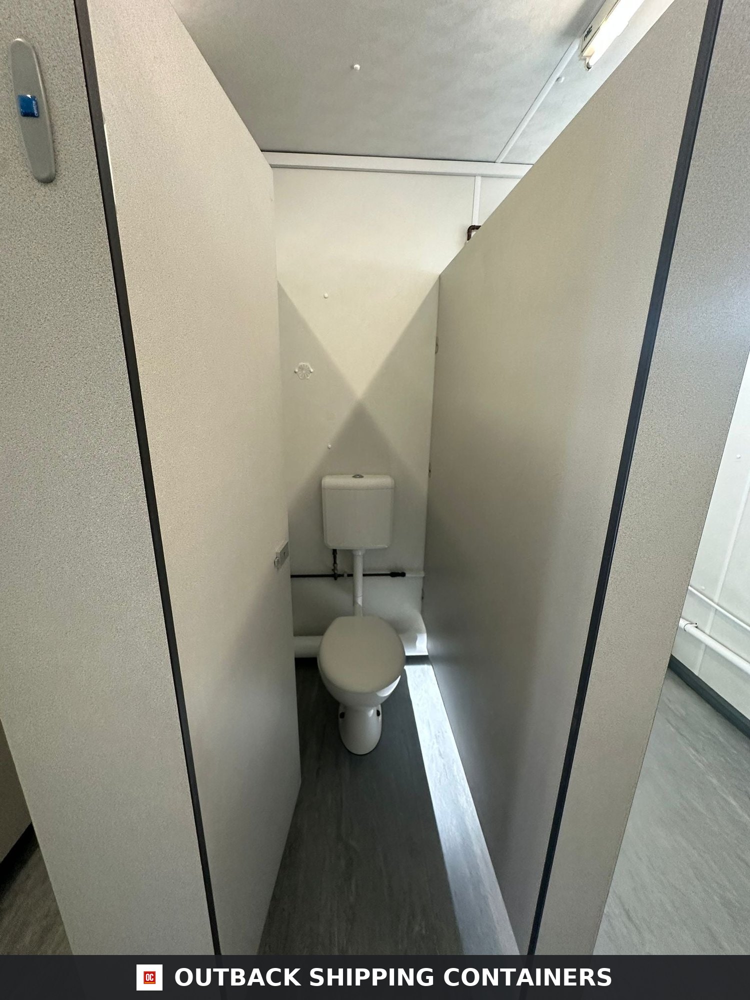 32 x 10Ft 32x10FT for Sale — Window and Shutter Detail | Outback Shipping Containers Interior view of a toilet stall inside a refurbished 32ft shipping container office and canteen block