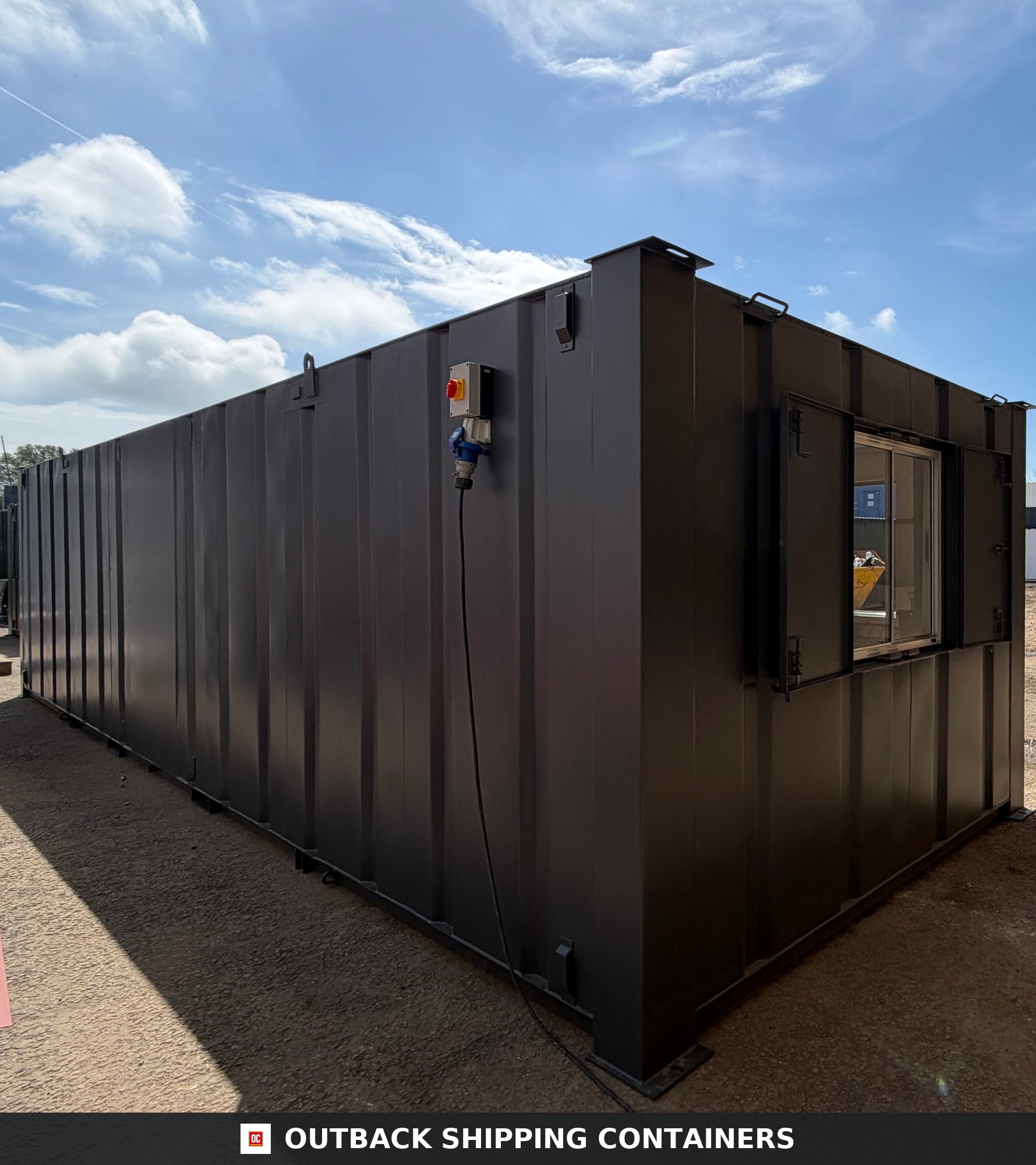 32x10ft Cabin for Sale — Door and Entry Detail | Outback Shipping Containers 2 3 4 Refurbished 32x10ft black portable drying room container with anti-vandal steel shutters and exterior electrical inlet