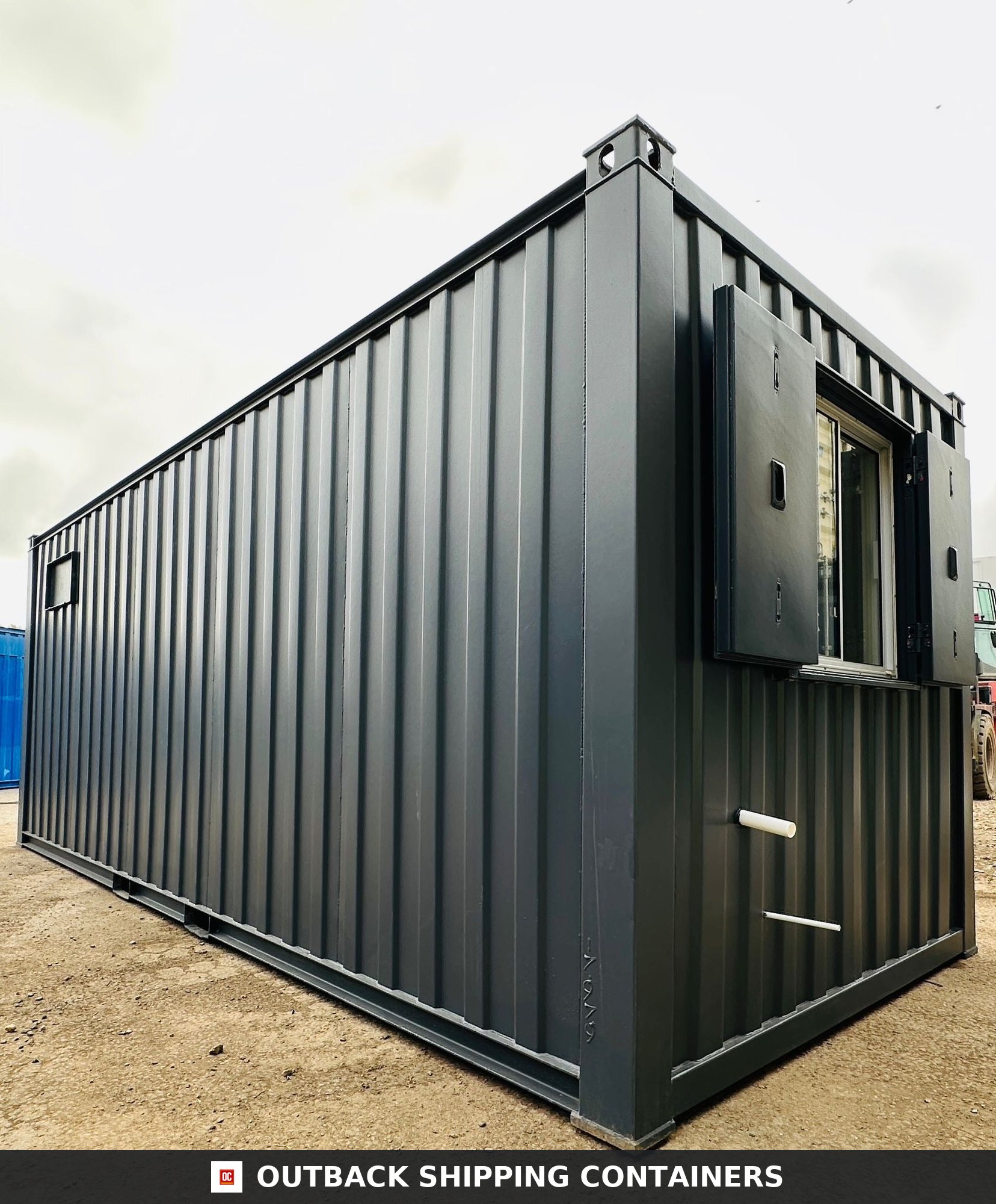 21x8ft for Sale — Corner Casting and Frame Detail | Outback Shipping Containers Interior view of refurbished 21x8ft anti vandal office showing white walls, herringbone floor, and kitchenette area