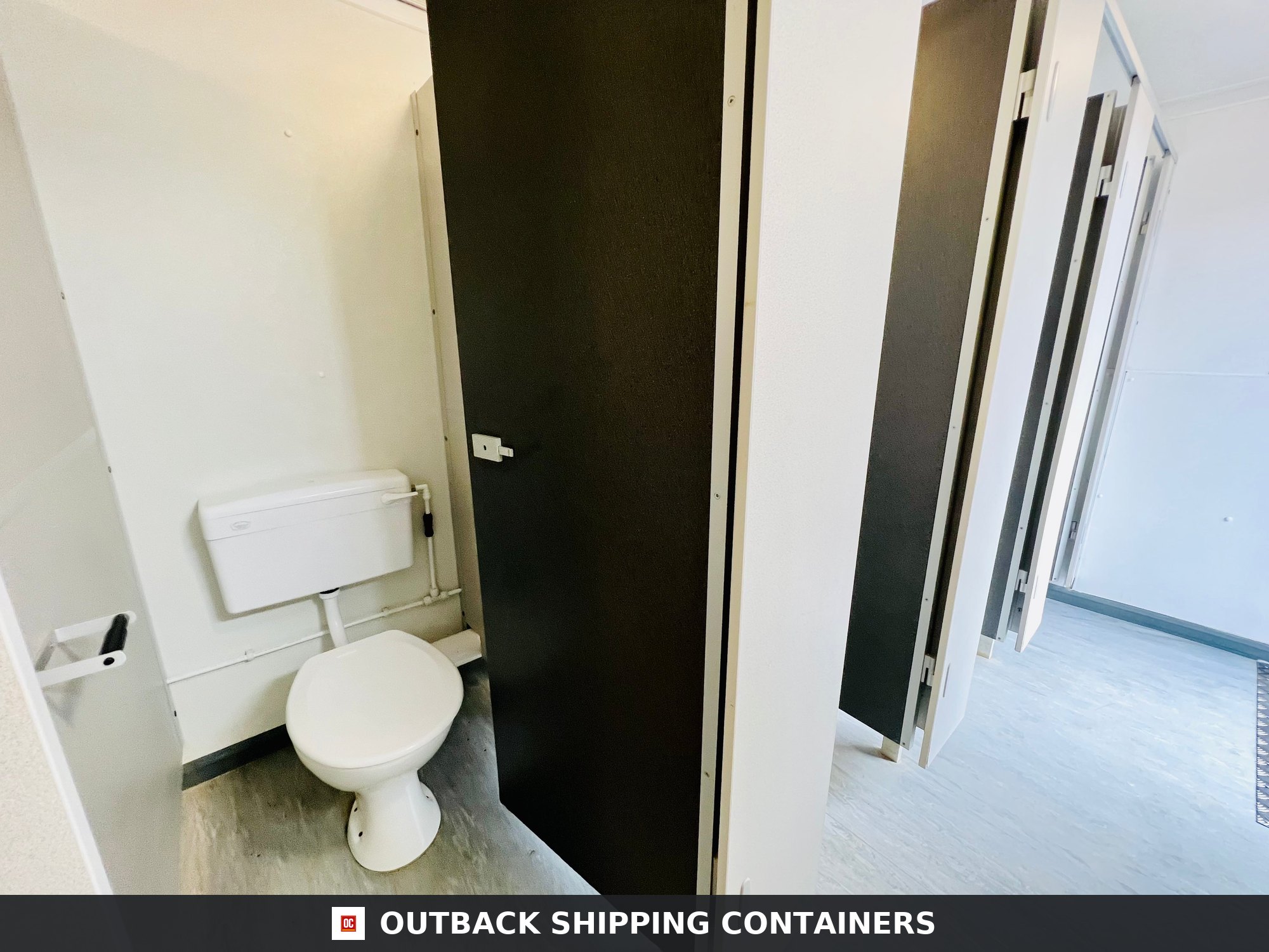 Toilet Block + Shower for Sale — Door and Entry Detail | Outback Shipping Containers Toilet Block + Shower — 24 x 9 ft — 4 + 1 Toilet with Separate Shower Room — No 882 — product gallery image 6 of 15
