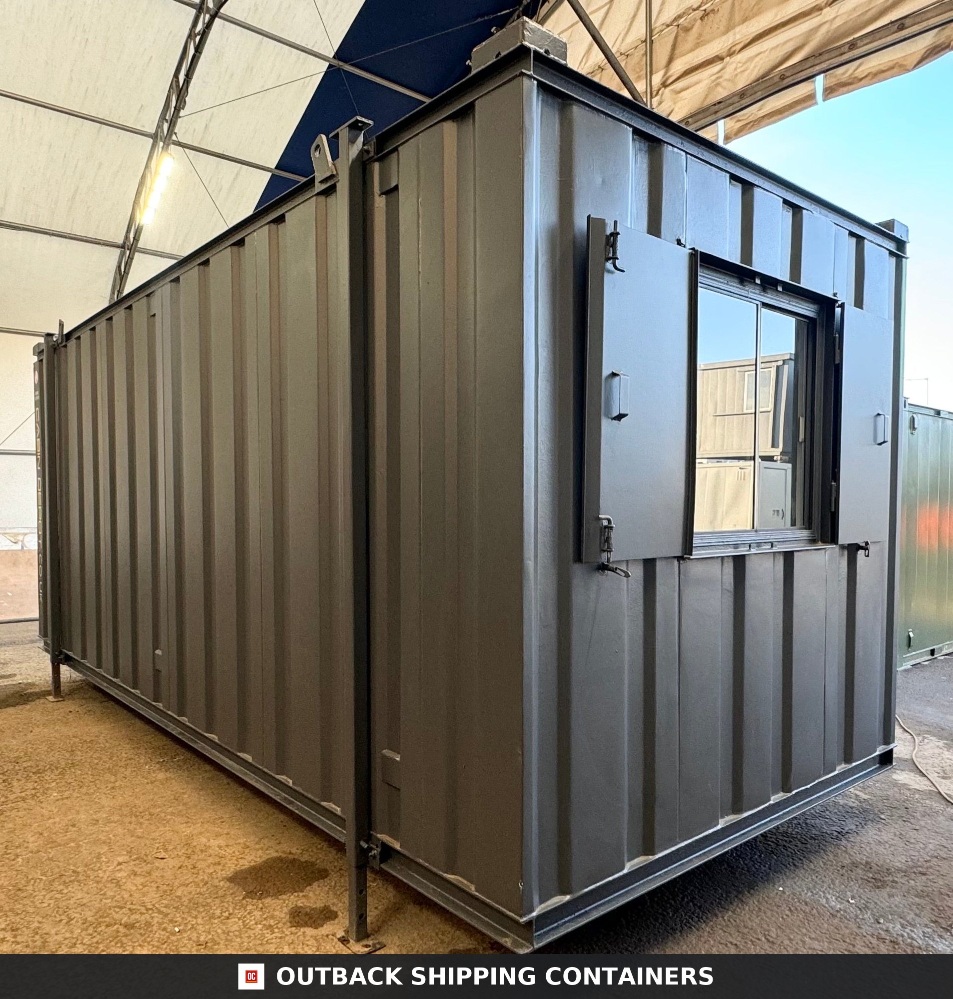 20x8ft for Sale — Rear Exterior View | Outback Shipping Containers Interior of a refurbished 20ft shipping container office with white walls and grey herringbone flooring