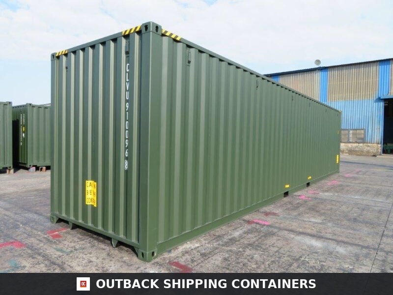 40ft new shipping container in olive green color featuring corrugated steel walls and yellow caution decals on a concrete lot