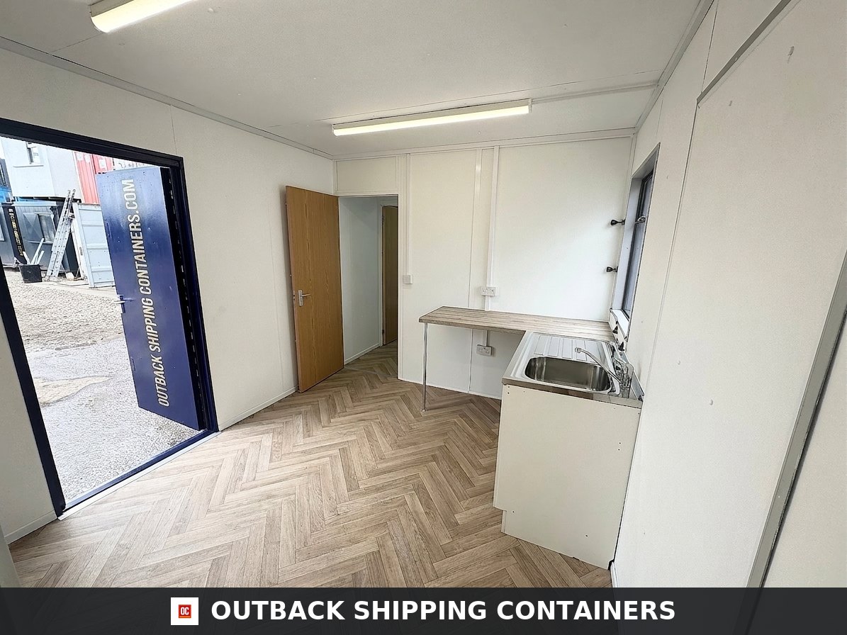 CUSTOM for Sale — Three-Quarter Angle View | Outback Shipping Containers CUSTOM — 32 x 10 ft Cabin — Office + Canteen + 1+1 WC/Wash Rooms — Anti-Vandal — No 1105 — product gallery image 2 of 22