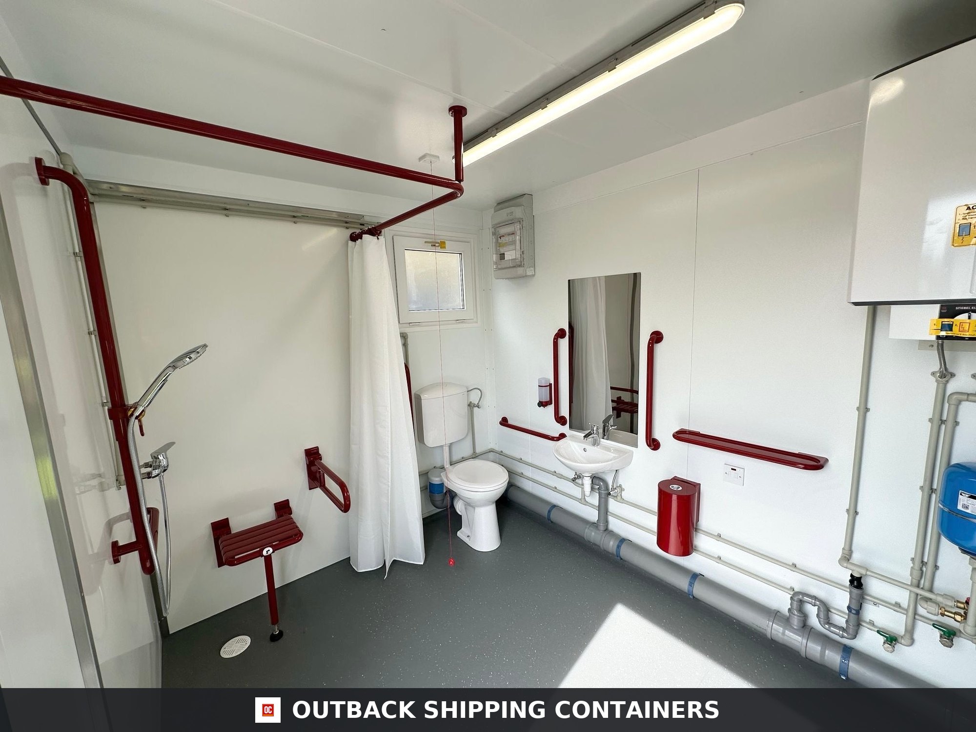CUSTOM for Sale — Three-Quarter Angle View | Outback Shipping Containers CUSTOM — Disabled Access Toilet Block With Shower Facility — 10 x 8 ft Portable — No 794 — product gallery image 2 of 16
