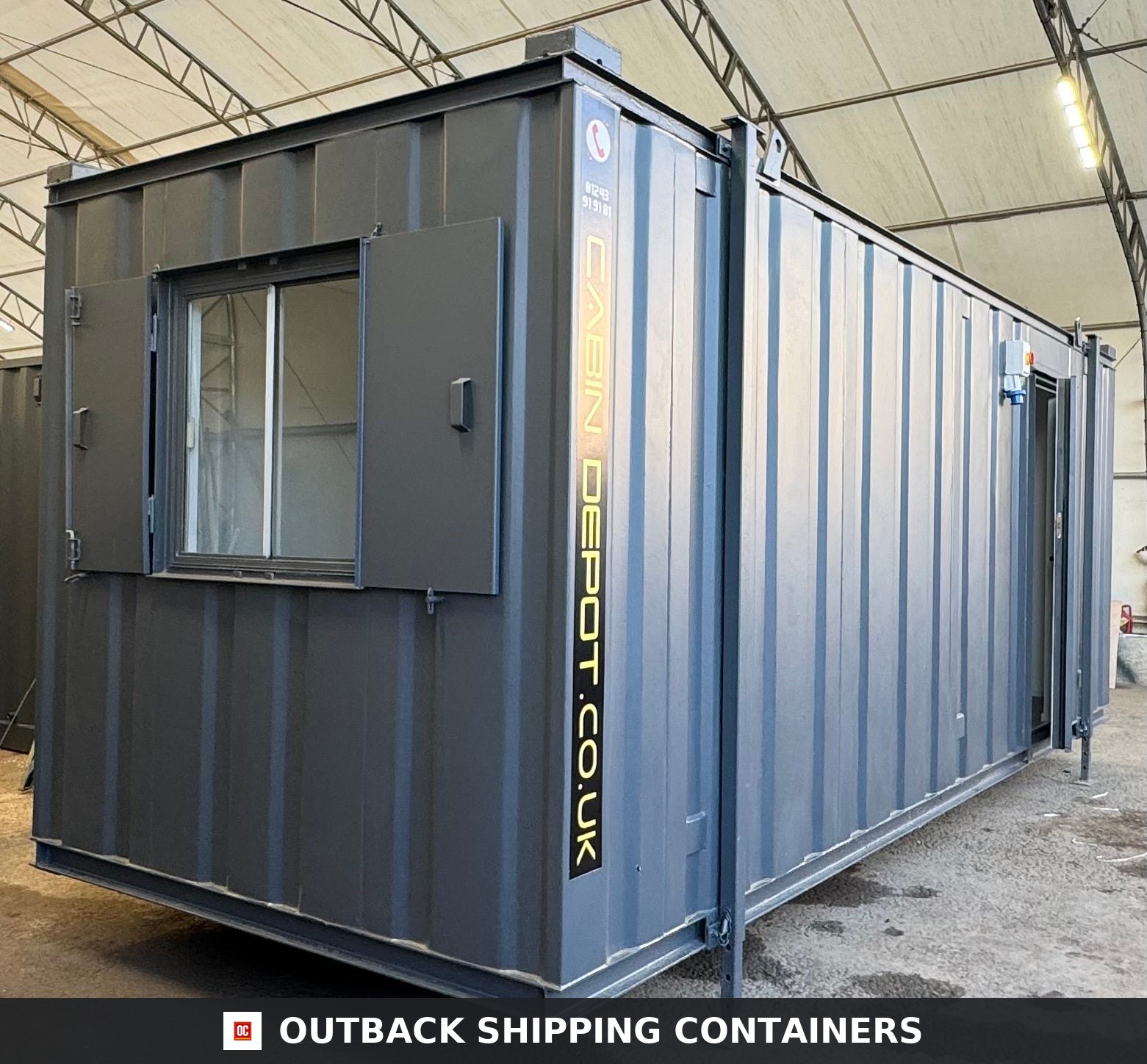 20x8ft for Sale — Door and Entry Detail | Outback Shipping Containers Exterior view of a dark gray 20ft shipping container office with a side window and steel security shutters