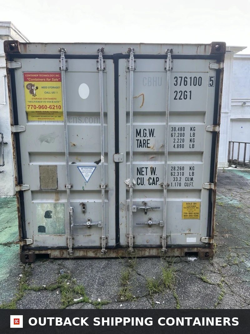 20ft Standard Storage Container for Sale — Rear Exterior View | Outback Shipping Containers 20ft standard storage container cargo doors showing locking bars, handle hardware, and max gross weight markings