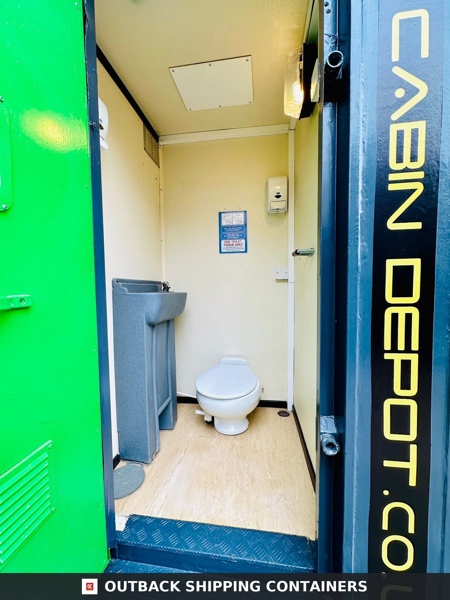Groundhog Towable Mobile Welfare | Towable Canteen + Toilet — Roof and Structural Detail Interior of a refurbished Groundhog towable welfare unit showing a private toilet room with a white basin and grey sink