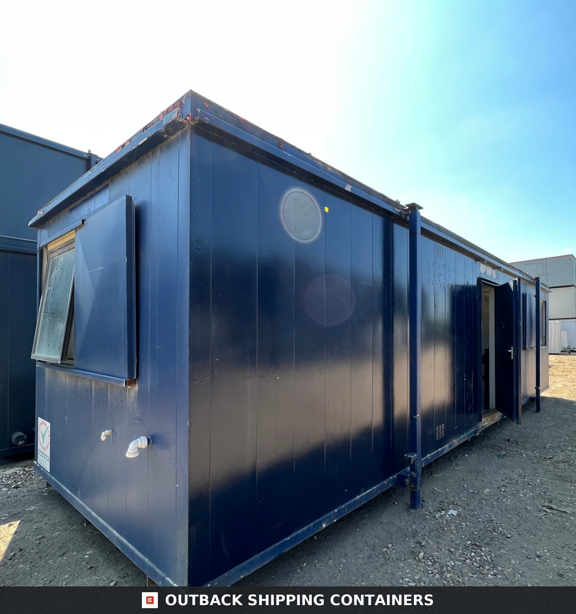 24x9 ft 24X9FT for Sale — Corner Casting and Frame Detail | Outback Shipping Containers Refurbished 24x9 blue anti-vandal shipping container office with open window shutters and side entry door
