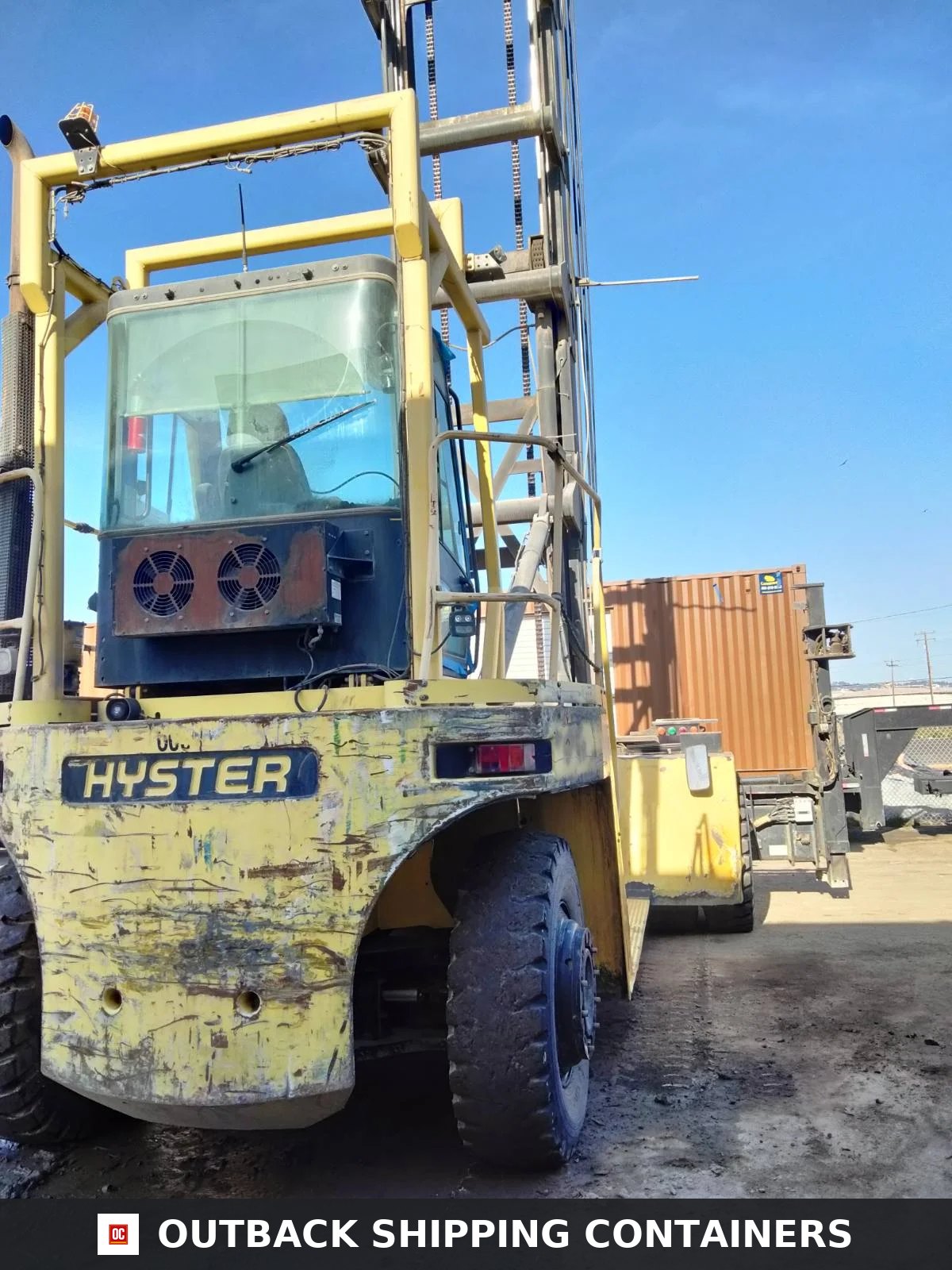 Hyster H22XM-12EC 9-High Stacker Container Handler for sale — three-quarter front angle