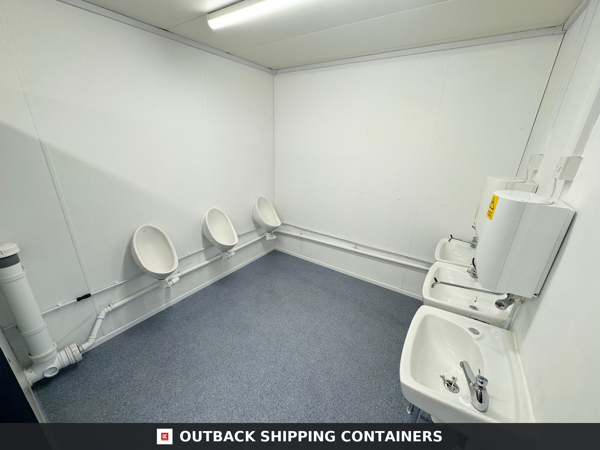 24 x 9 ft for Sale — Interior View | Outback Shipping Containers 24 x 9 ft — 4 + 1 Toilet Block — Anti-Vandal Portable Site Accommodation — No 768 — product gallery image 4 of 17