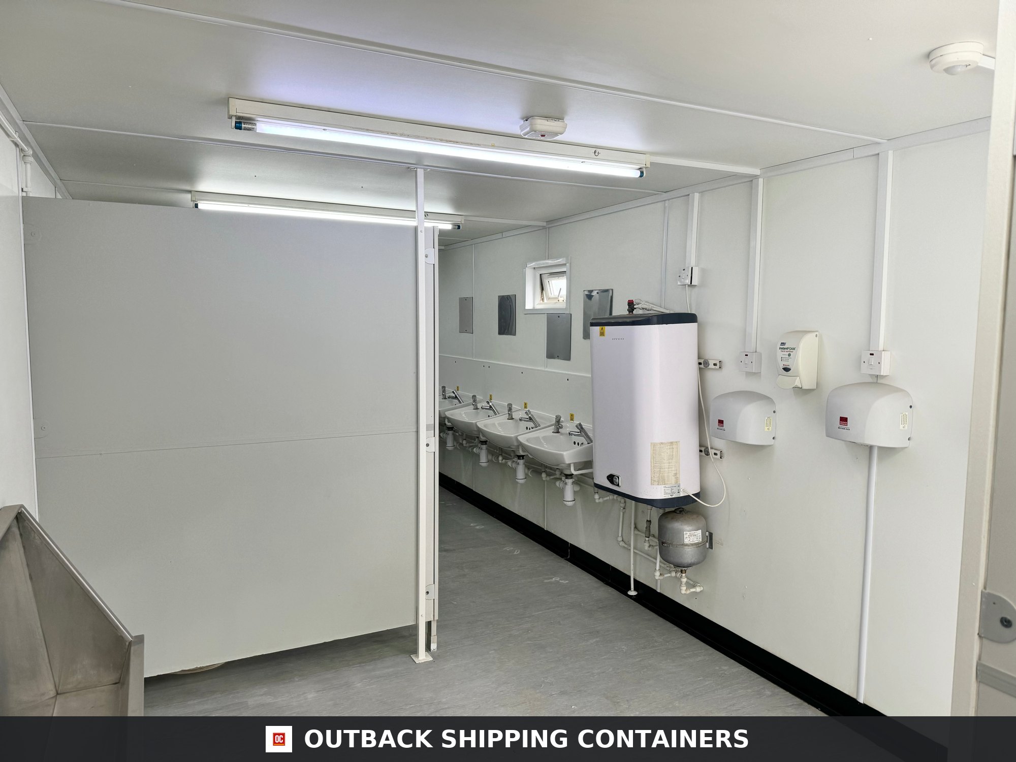32 x 10 ft for Sale — Three-Quarter Angle View | Outback Shipping Containers 32 x 10 ft — 6+1 Toilet Block — Anti-Vandal Portable Toilet Block — No 1070 — product gallery image 2 of 19