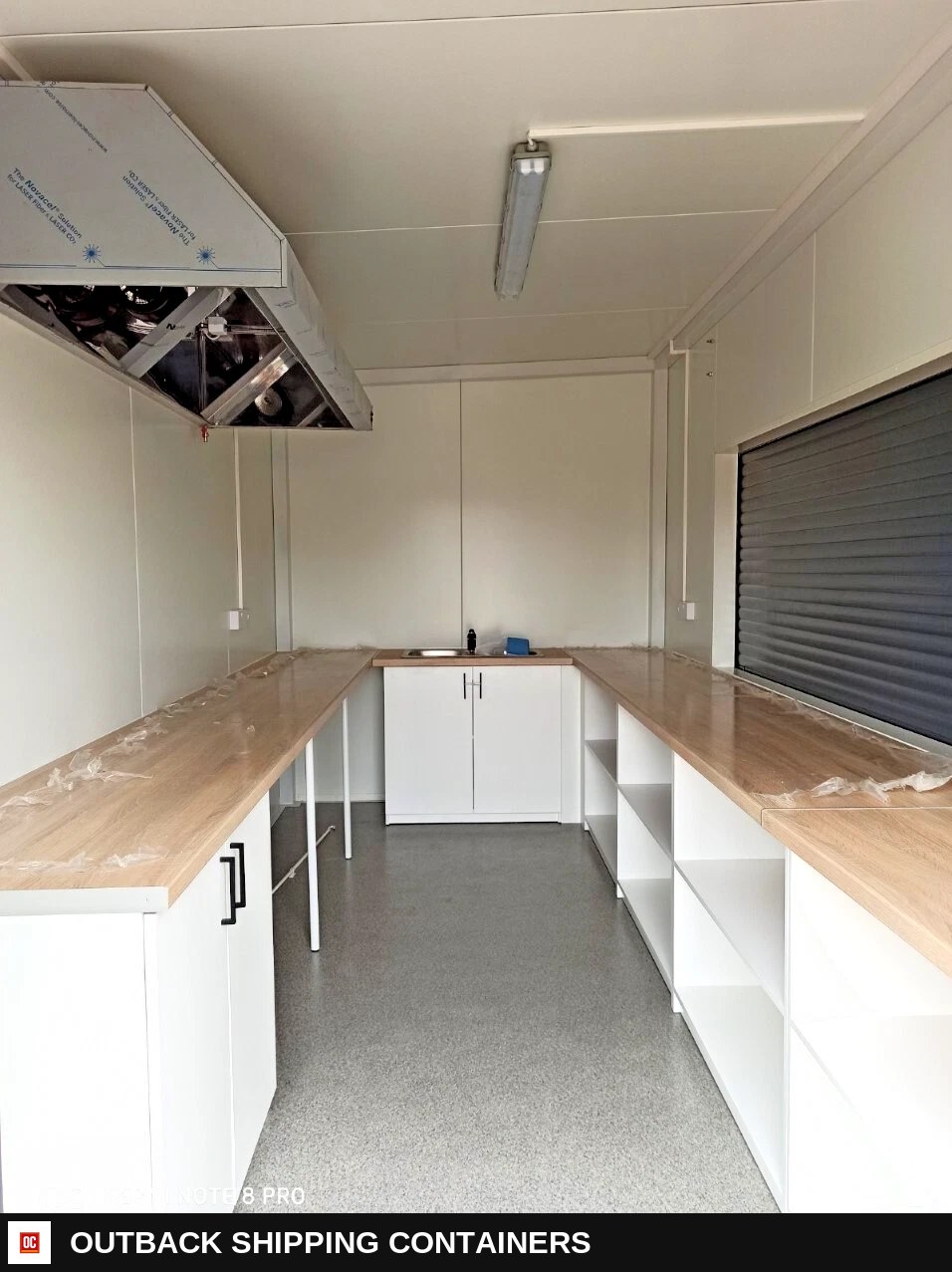 16ft x 8ft Street Food Container | Catering Kiosk Cabin — Stainless Prep And Counter Area | Outback Shipping Containers 16ft x 8ft Street Food Container | Catering Kiosk Cabin for sale — stainless prep and counter area