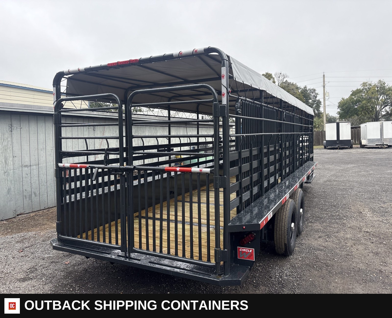 New 2026 Circle W 6.5 x 24 Gooseneck Livestock Trailer 14k GVWR — Three-Quarter Front Angle | Outback Shipping Containers New 2026 Circle W 6.5 x 24 Gooseneck Livestock Trailer 14k GVWR for sale — three-quarter front angle