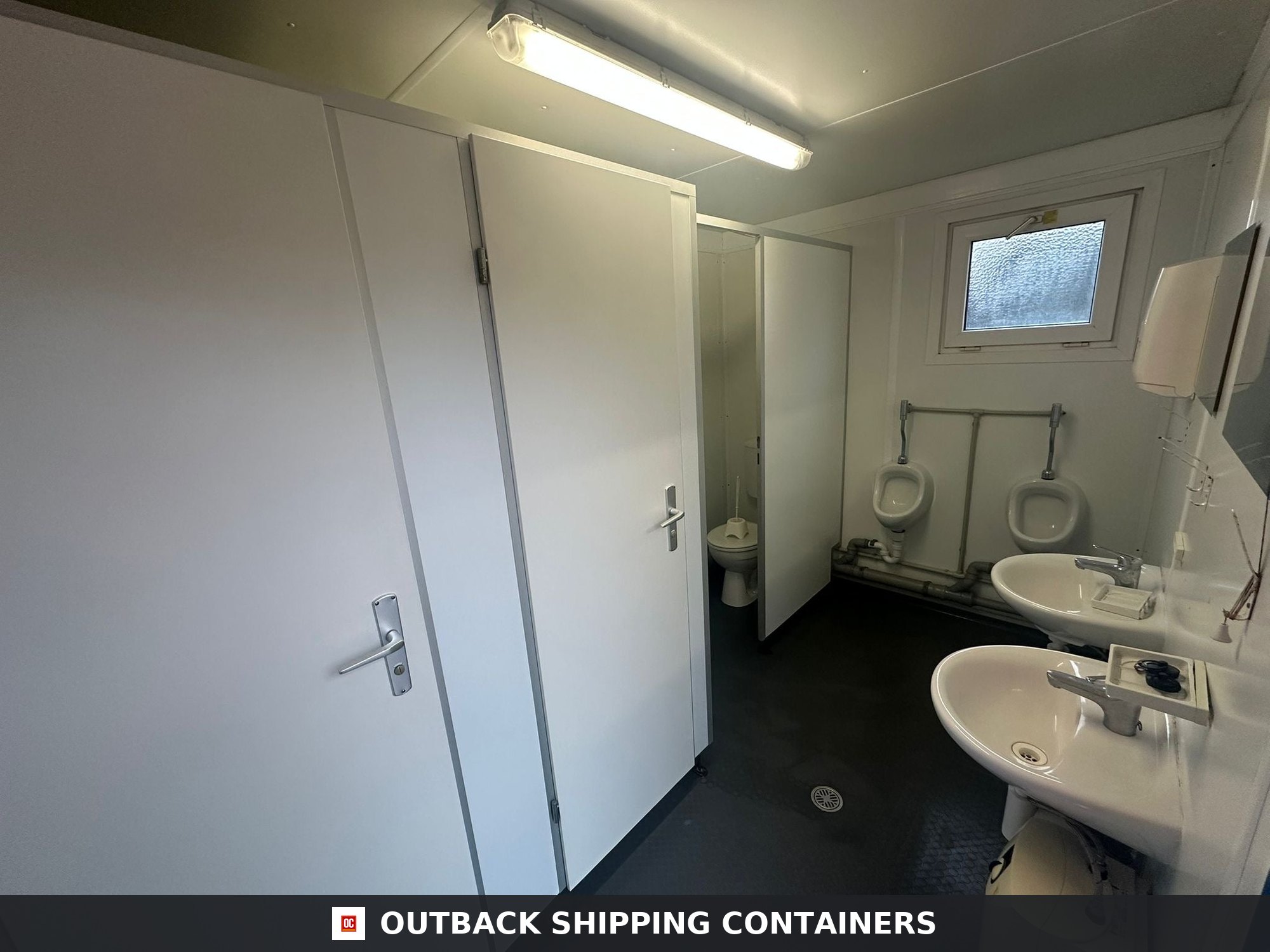 16 x 8 ft for Sale — Side Profile View | Outback Shipping Containers Second exterior view of the 16 x 8 ft portable toilet block showing the side elevation and window arrangement