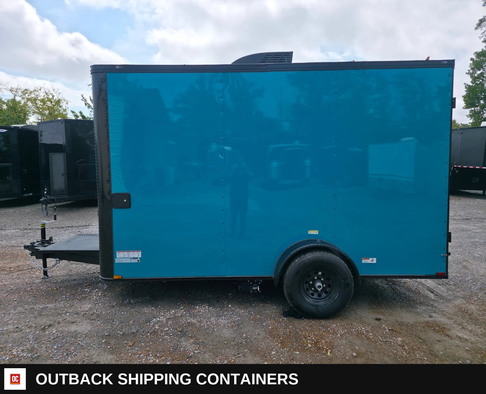 7 x 12 Water Blue Flat Front Concession Catering Trailer — Three-Quarter Front Angle | Outback Shipping Containers 7 x 12 Water Blue Flat Front Concession Catering Trailer for sale — three-quarter front angle