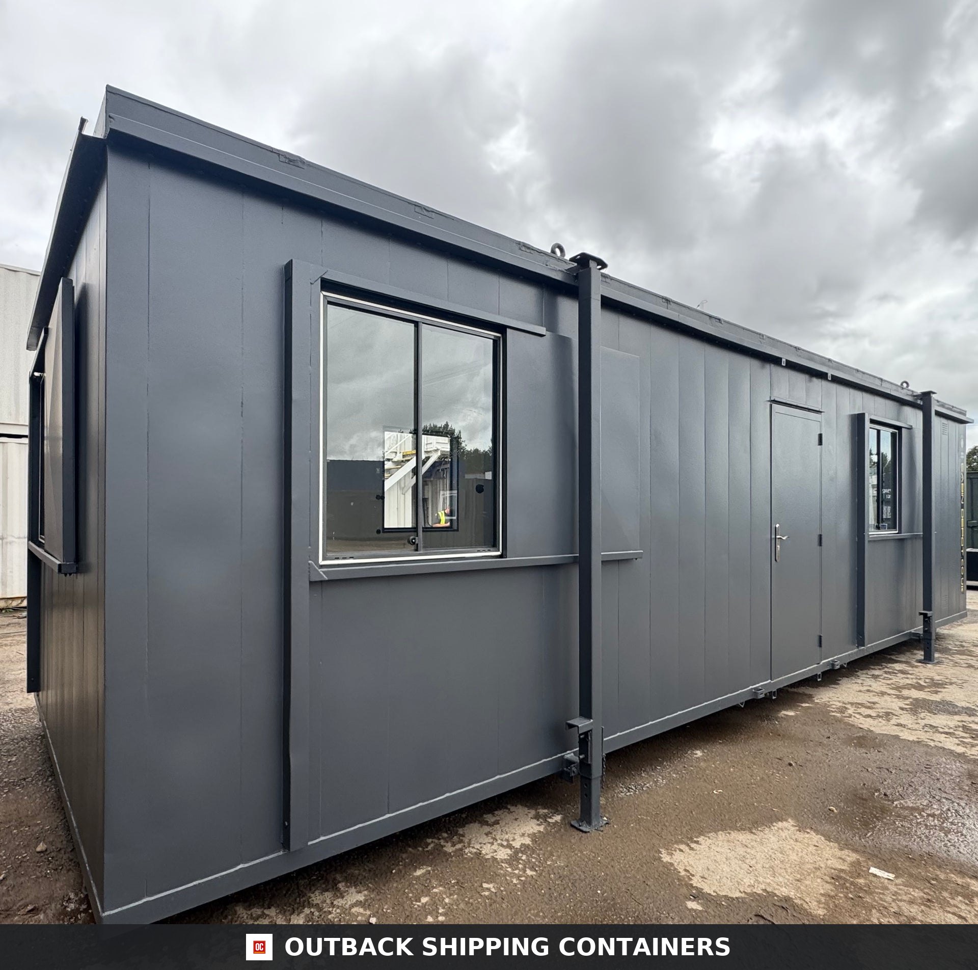 32x10Ft for Sale — Corner Casting and Frame Detail | Outback Shipping Containers Interior of a refurbished 32x10 canteen cabin featuring herringbone flooring and a kitchen sink station with wood counters