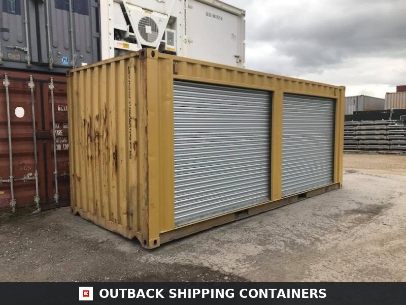 Yellow 20ft Used Container for Sale — Rear Exterior View | Outback Shipping Containers Yellow 20ft shipping container with two large silver roll-up doors on the side wall showing used surface wear