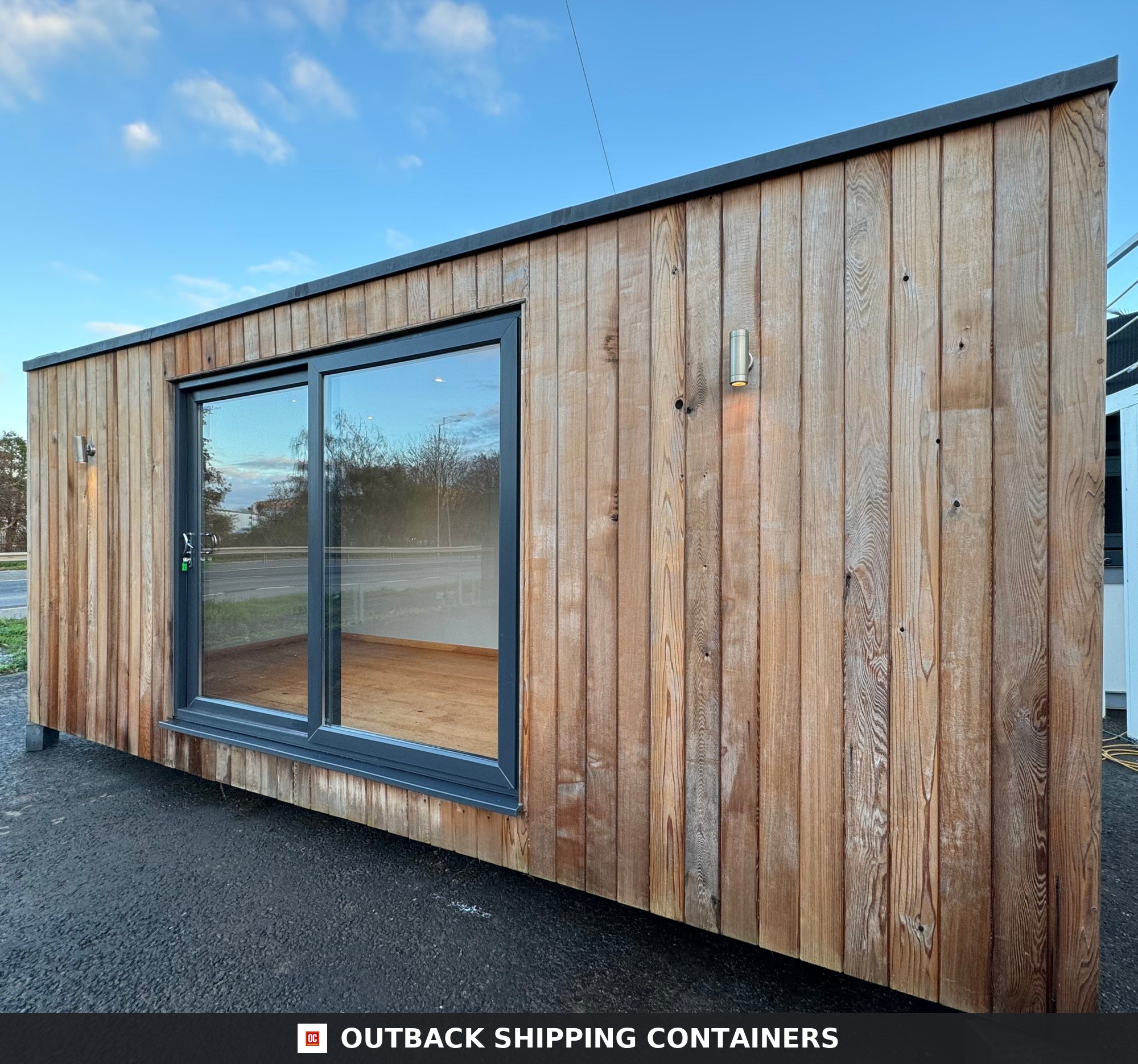 20x8ft for Sale — Side Profile View | Outback Shipping Containers 2 CD-1064 20x8ft — CUSTOM SHIPPING CONTAINER CONVERSION — Portable Bui — angle 1