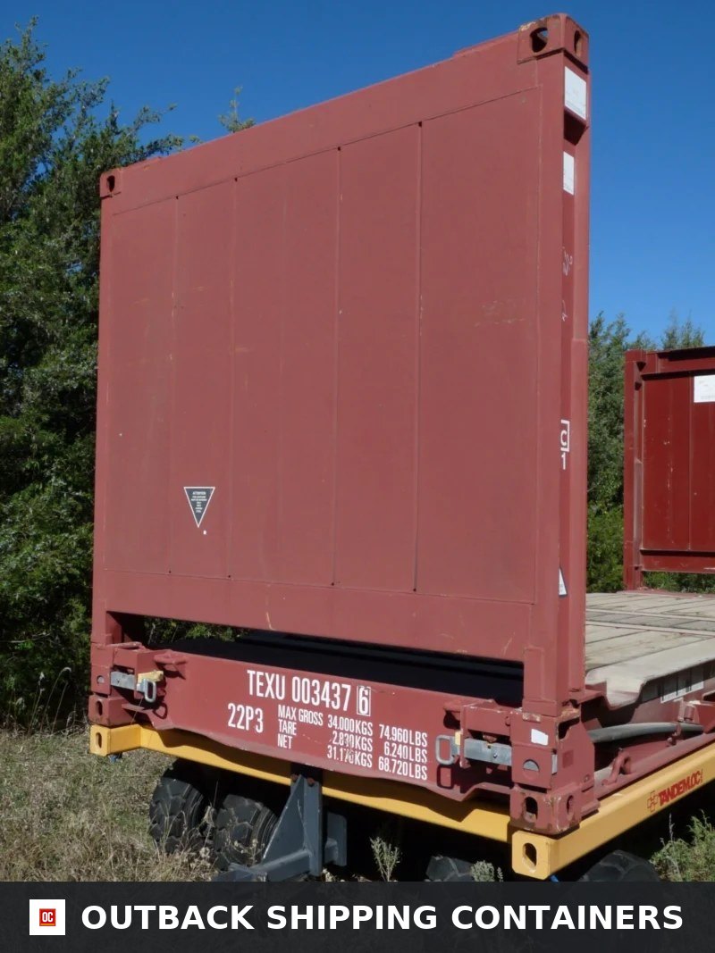 Rear view of a red 20FT flat rack shipping container end wall showing weight ratings and corner castings