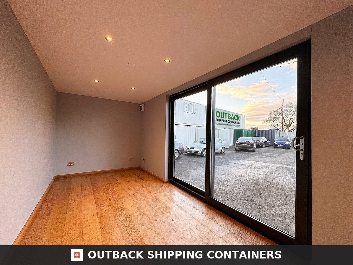 20x8ft for Sale — Three-Quarter Angle View | Outback Shipping Containers 2 CD-1064 20x8ft — CUSTOM SHIPPING CONTAINER CONVERSION — Portable Bui — angle 2