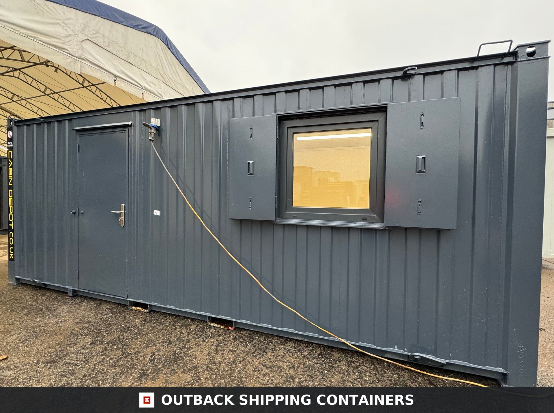 21x8ft Office Container for Sale — Roof and Structural Detail | Outback Shipping Containers Interior view of refurbished 21ft shipping container office with white walls and herringbone wood flooring