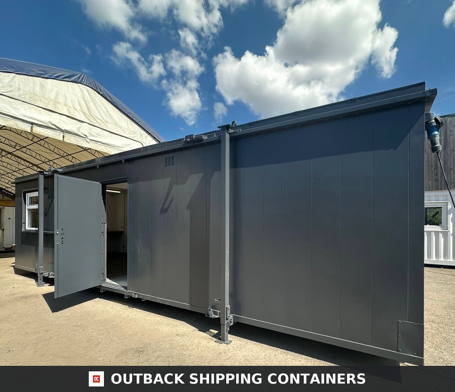 32 x 10Ft 32x10FT for Sale — Roof and Structural Detail | Outback Shipping Containers Side profile of a dark grey 32x10 canteen and office cabin unit with an open steel door and white framed windows