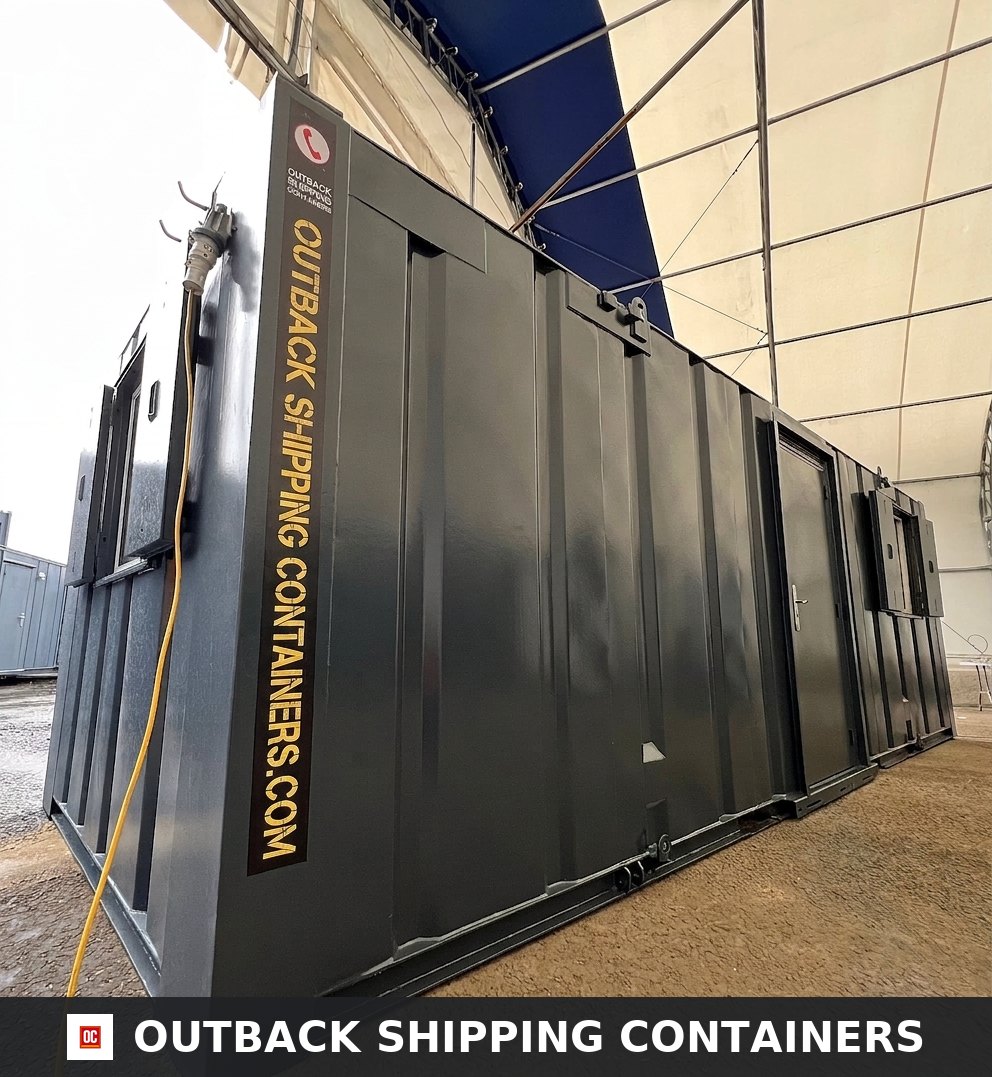 Side profile of a dark gray 24x9 ft anti-vandal shipping container office with steel door and window shutters