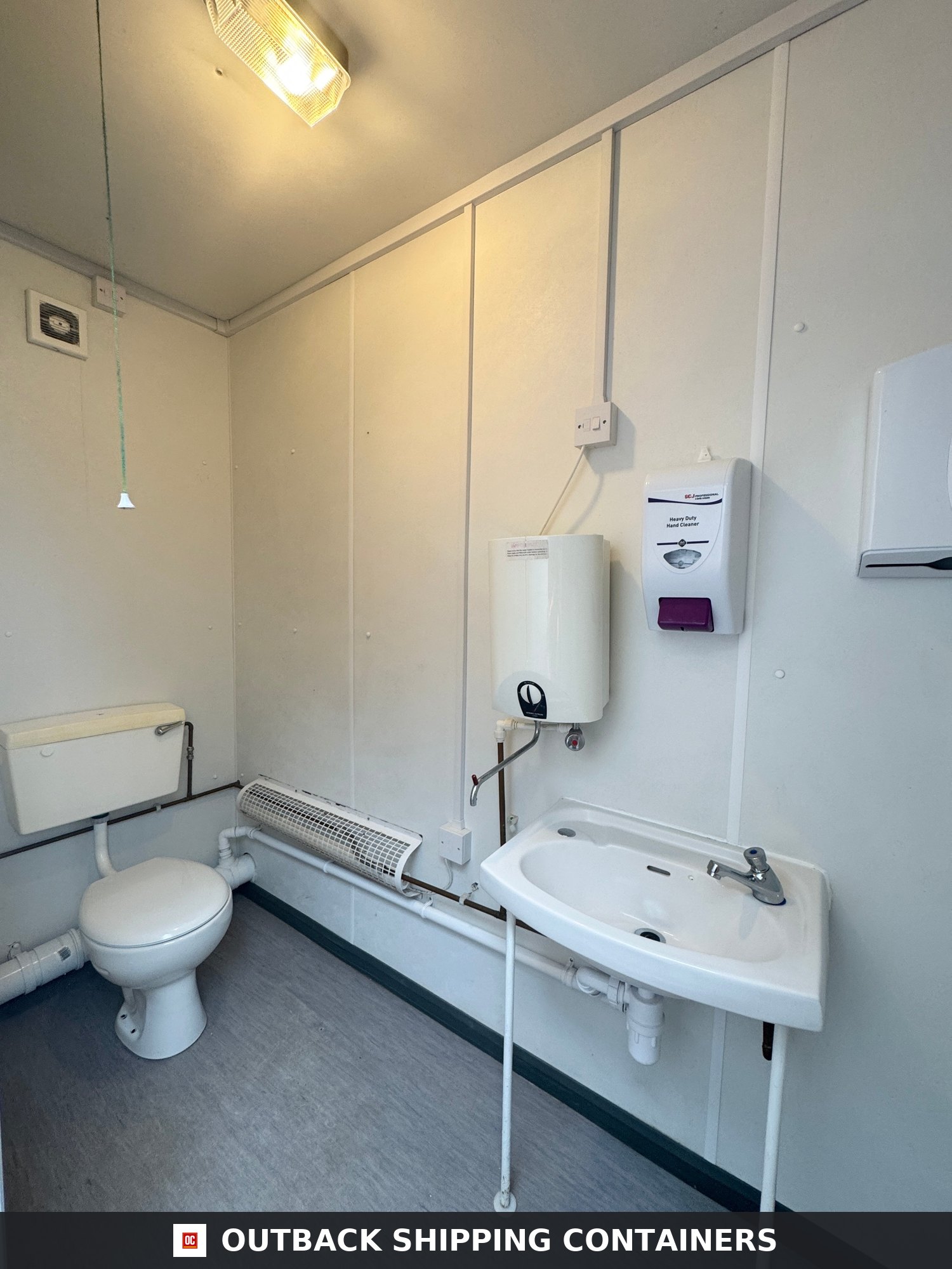 16 x 9 ft for Sale — Three-Quarter Angle View | Outback Shipping Containers 16 x 9 ft — 3+1 Toilet Block — Building Site Accommodation — Portable Anti-Vandal Cabin - image 2