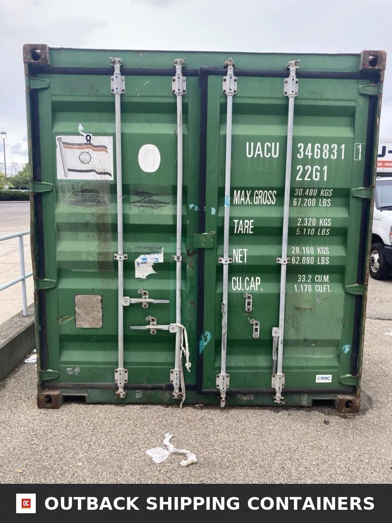 Rear view of a green 20ft UACU shipping container doors with locking rods and weight specifications