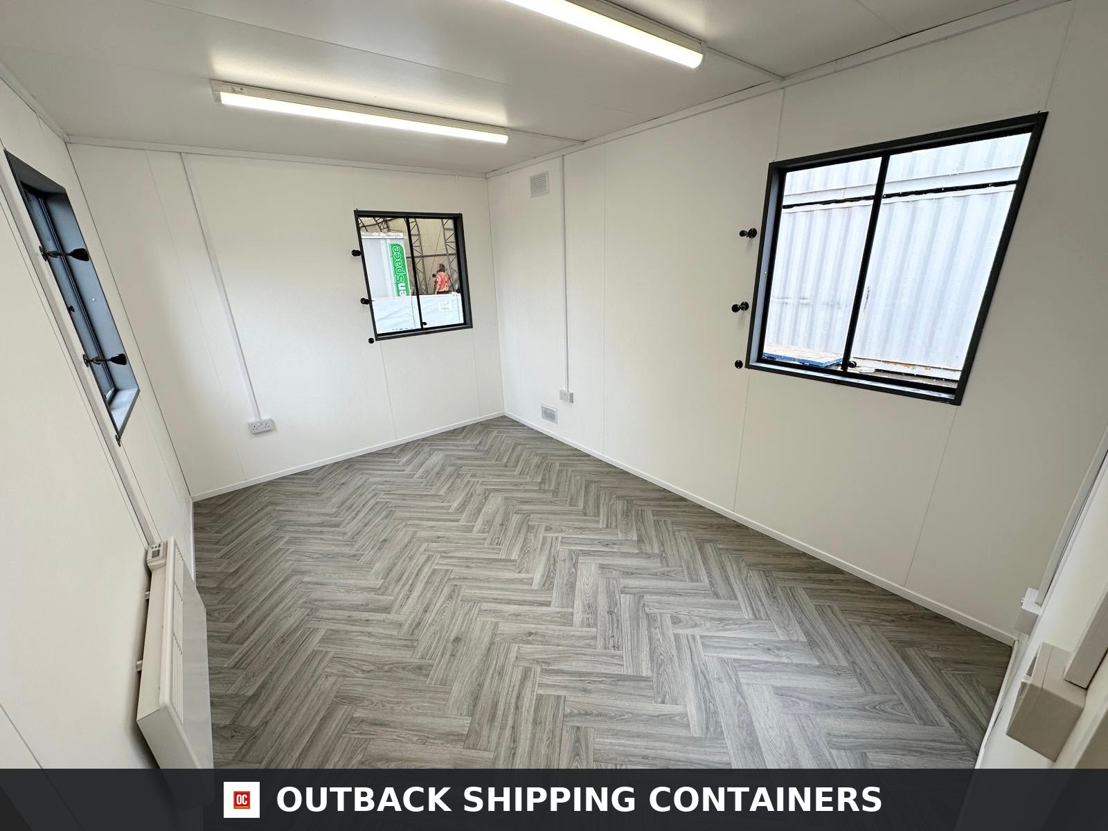 32x10Ft for Sale — Window and Shutter Detail | Outback Shipping Containers Refurbished 32x10ft gray steel canteen office cabin with multiple large windows and a central entrance door