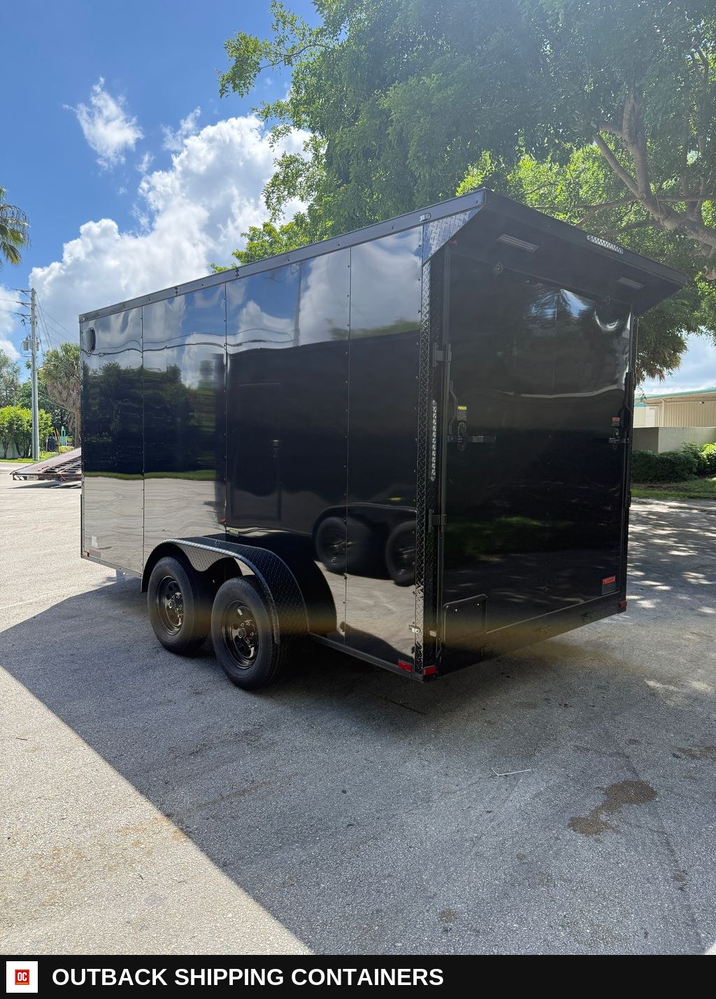 New 2027 Hook & Line 7 x 14 Enclosed Trailer 7k GVWR — Three-Quarter Front Angle | Outback Shipping Containers New 2027 Hook & Line 7 x 14 Enclosed Trailer 7k GVWR for sale — three-quarter front angle