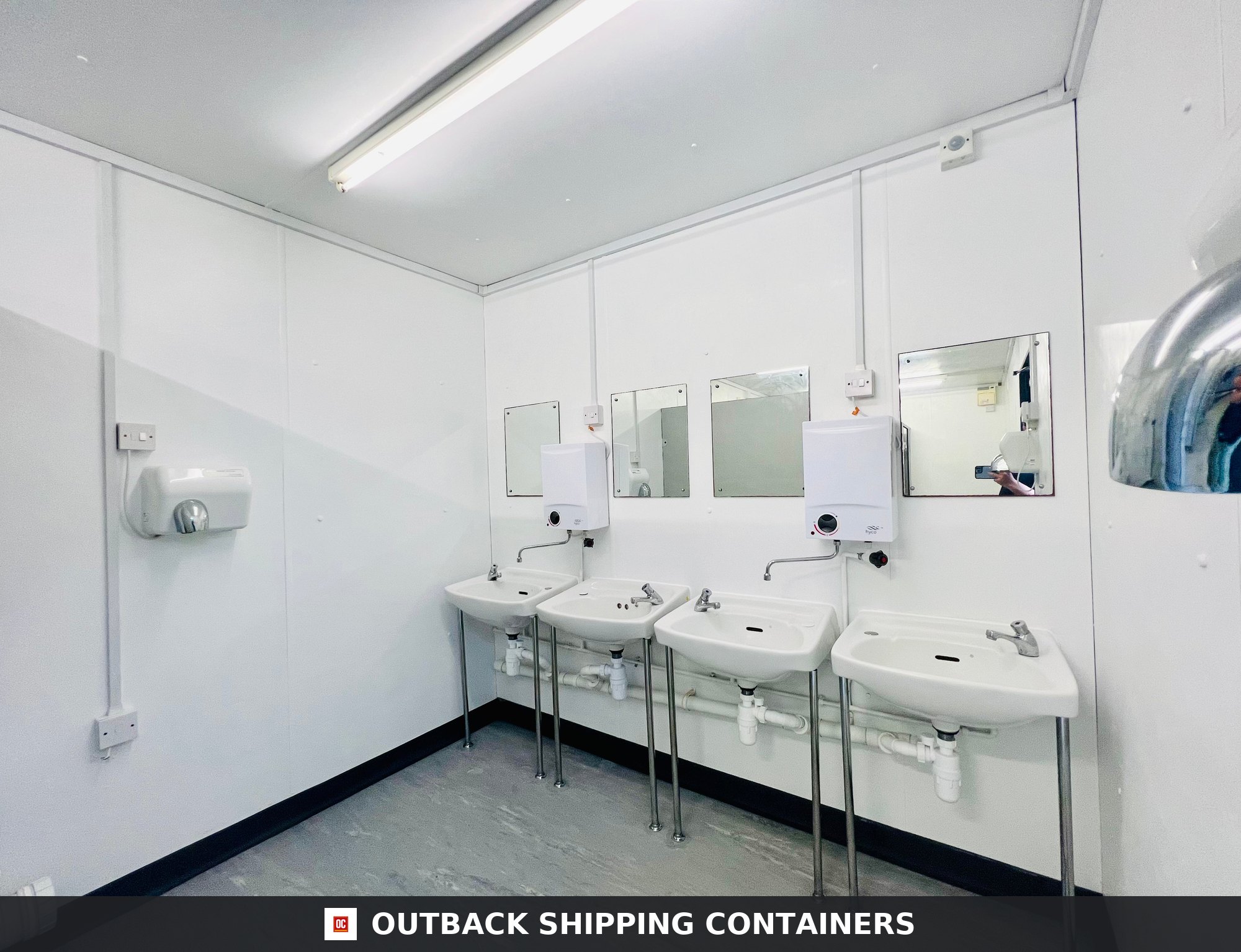 Toilet Block Cabin for Sale — Three-Quarter Angle View | Outback Shipping Containers Toilet Block Cabin — 24 x 9 ft Anti-Vandal — 5+1 Container Toilet WC — No 738 — product gallery image 3 of 13