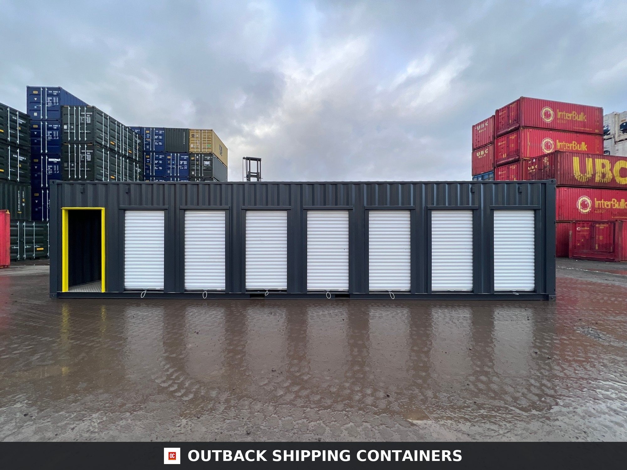 40ft high cube multi-store container featuring seven white roll-up doors and one yellow entrance frame