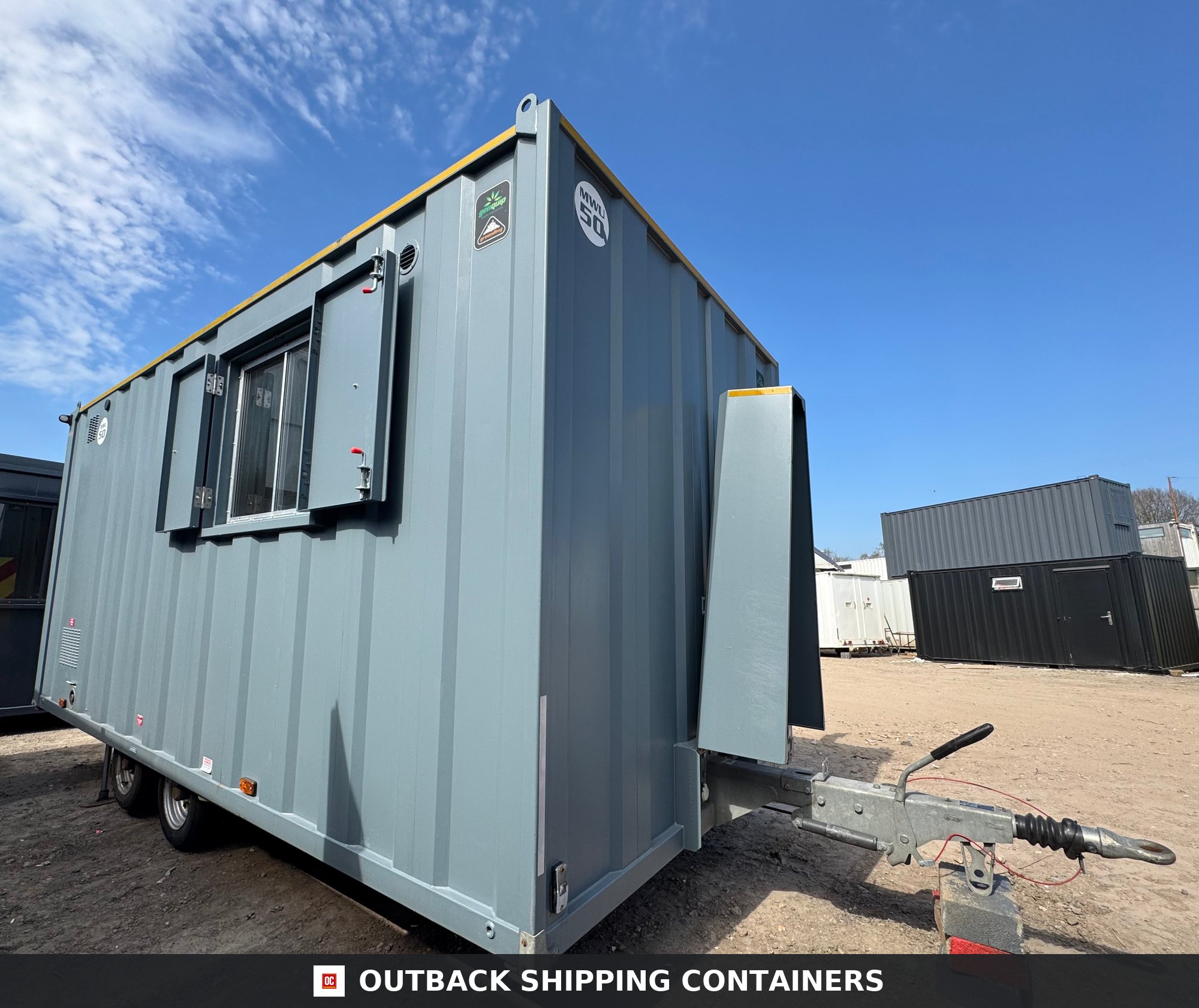 Groundhog Towable Mobile Welfare | 2019 Twin Axle 16ft Welfare — Roof and Structural Detail Groundhog towable mobile welfare unit with grey corrugated steel siding, a twin axle chassis, and a tow hitch assembly