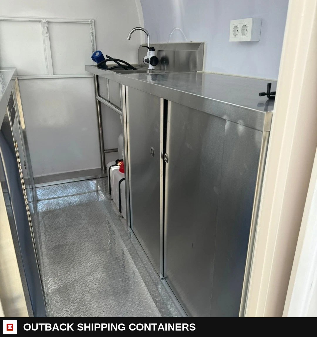 Black Mobile Catering Food Trailer Single Axle Serving Hatch Stainless Interior — Interior Kitchen Layout | Outback Shipping Containers Black Mobile Catering Food Trailer Single Axle Serving Hatch Stainless Interior for sale — interior kitchen layout