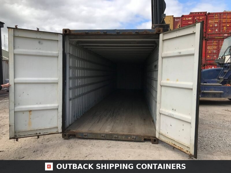 45ft Used Shipping Containers for Sale — Rear Exterior View | Outback Shipping Containers Interior view of a used 45ft shipping container with open double doors showing wood flooring and corrugated steel walls