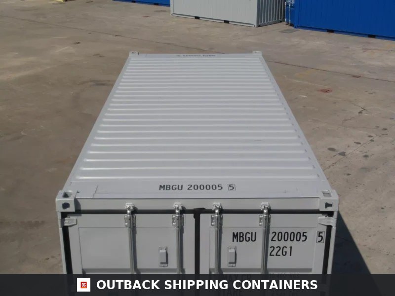 Top down view of a light grey 20ft shipping container showing corrugated roof and locking bar door details
