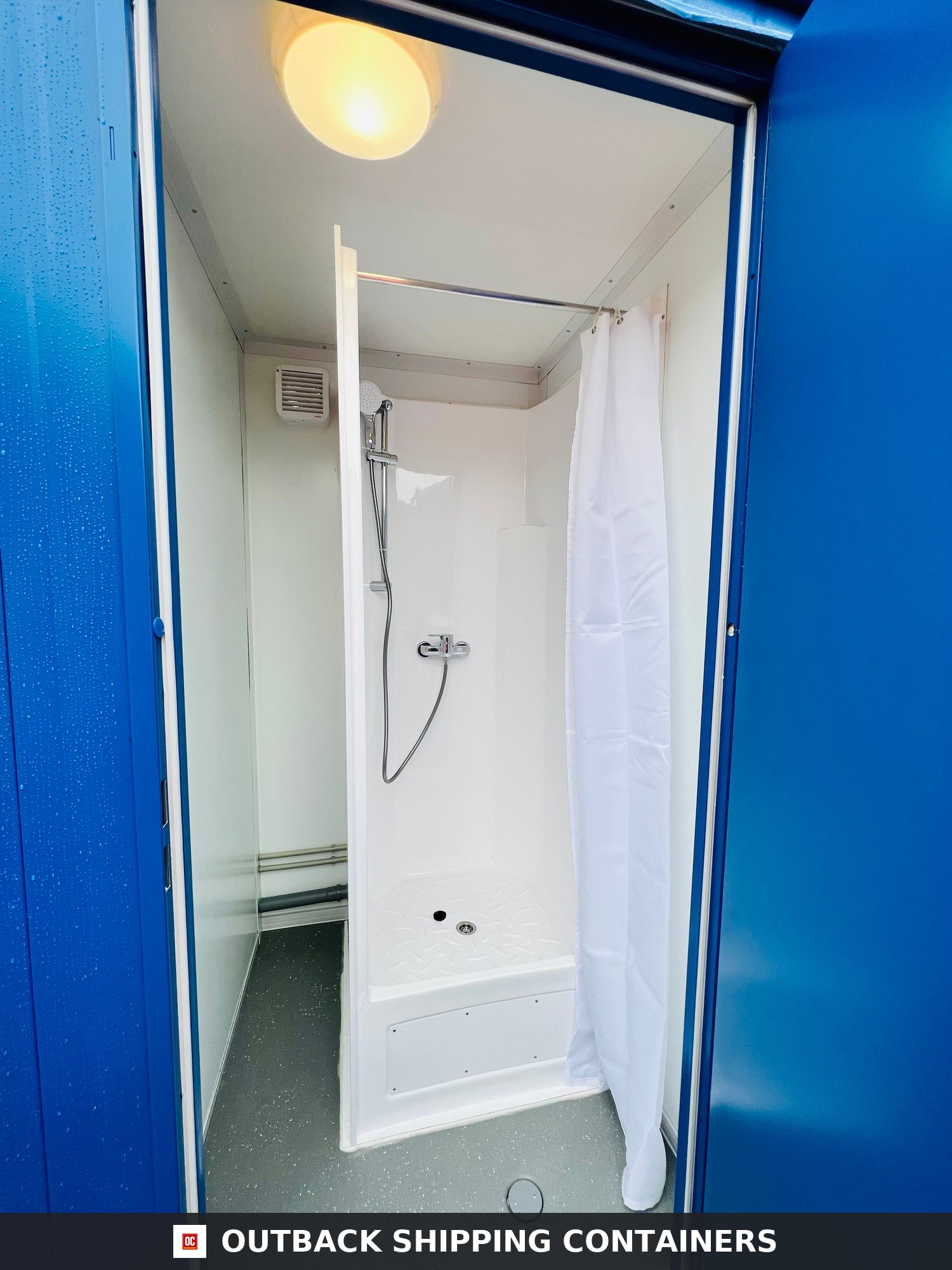 Shower Block with Toilet Block — Three-Quarter Angle View | Outback Shipping Containers Shower Block with Toilet Block — 8 x 5 ft Brand New Portable Containex — Blue — No 855 — product gallery image 2 of 8