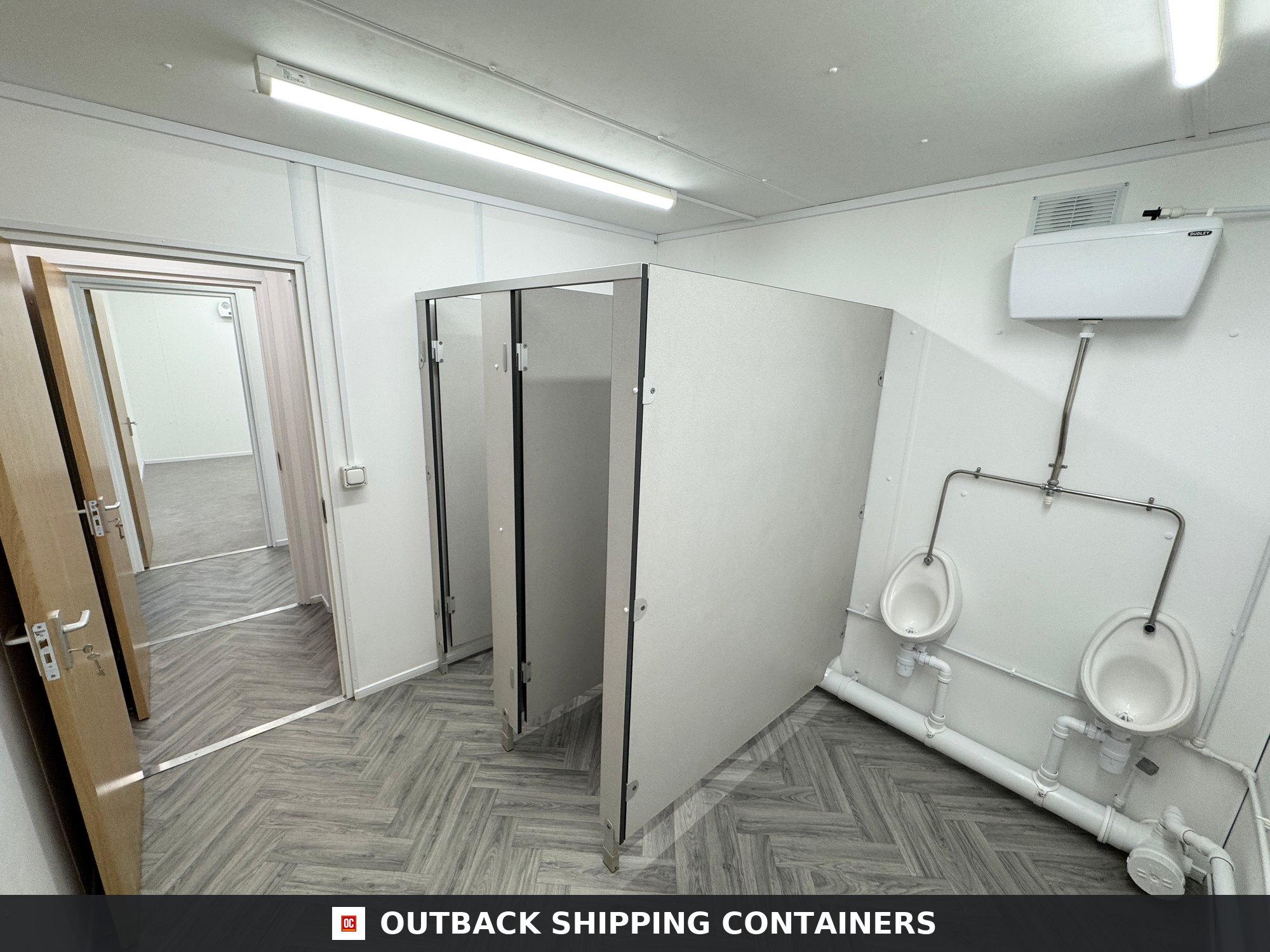 32 x 10 ft Anti-Vandal for Sale — Three-Quarter Angle View | Outback Shipping Containers 32 x 10 ft Anti-Vandal — 2+1 Toilet + Twin Shower Room — Changing Room — 50/50 Split — No 1561 — product gallery image 3 of 28