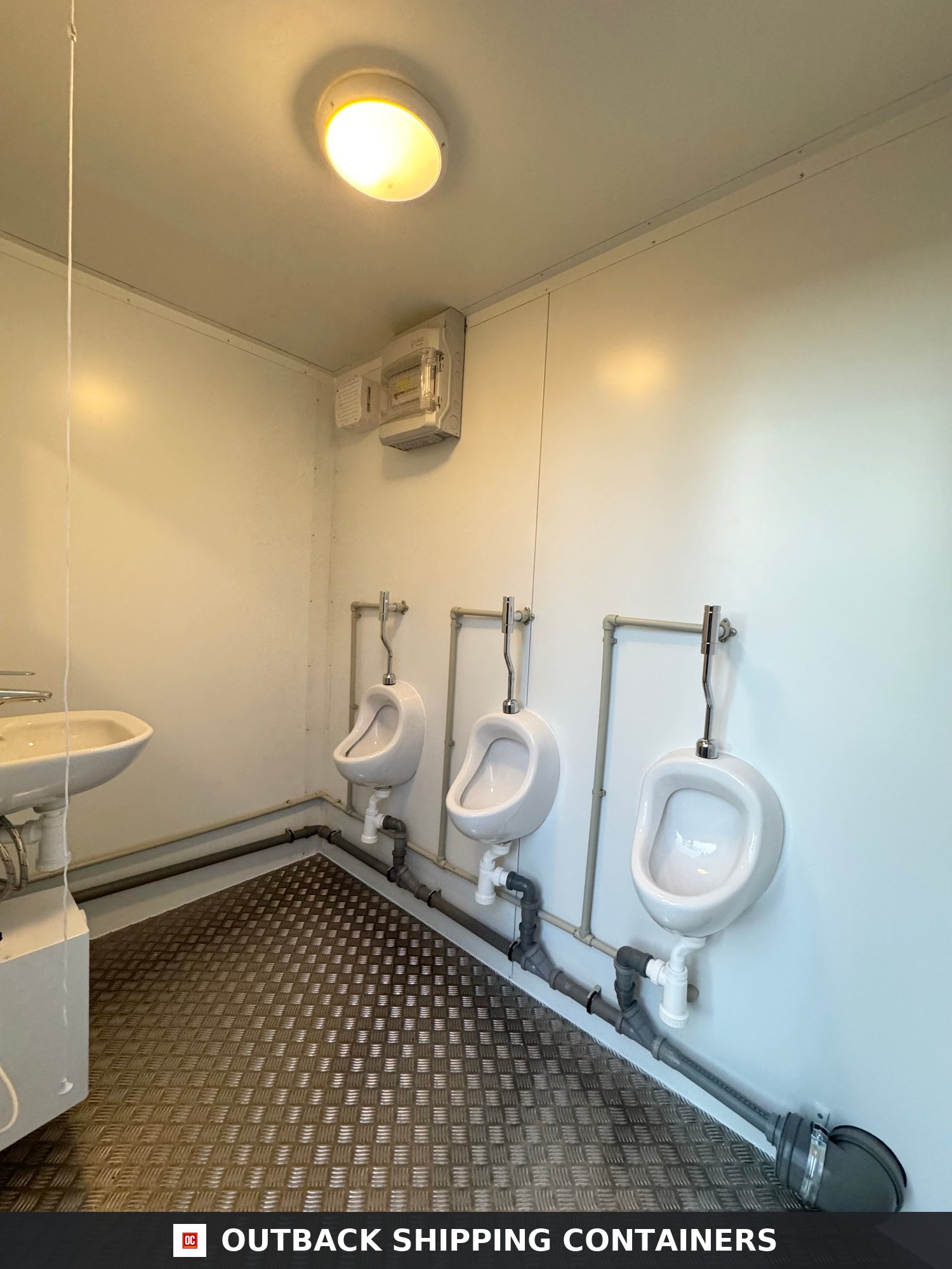 Triple Urinal Unit for Sale — Three-Quarter Angle View | Outback Shipping Containers Triple Urinal Unit — 8 x 5 ft NEW Portable Toilet Block — Green — No 793 — product gallery image 2 of 15