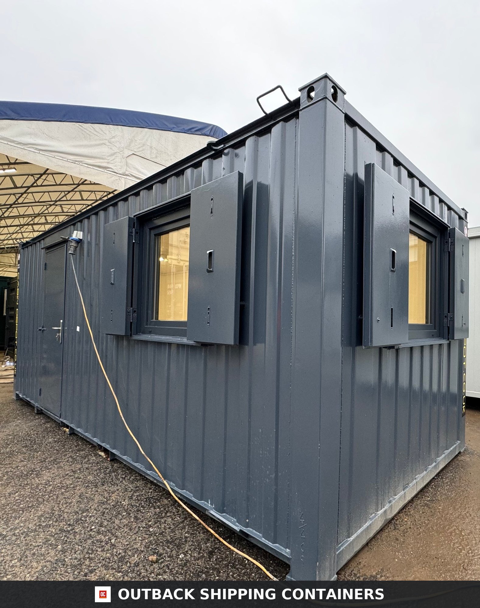 21x8ft Office Container for Sale — Rear Exterior View | Outback Shipping Containers Refurbished 21ft graphite grey shipping container office with a steel personnel door and a window with security shutters