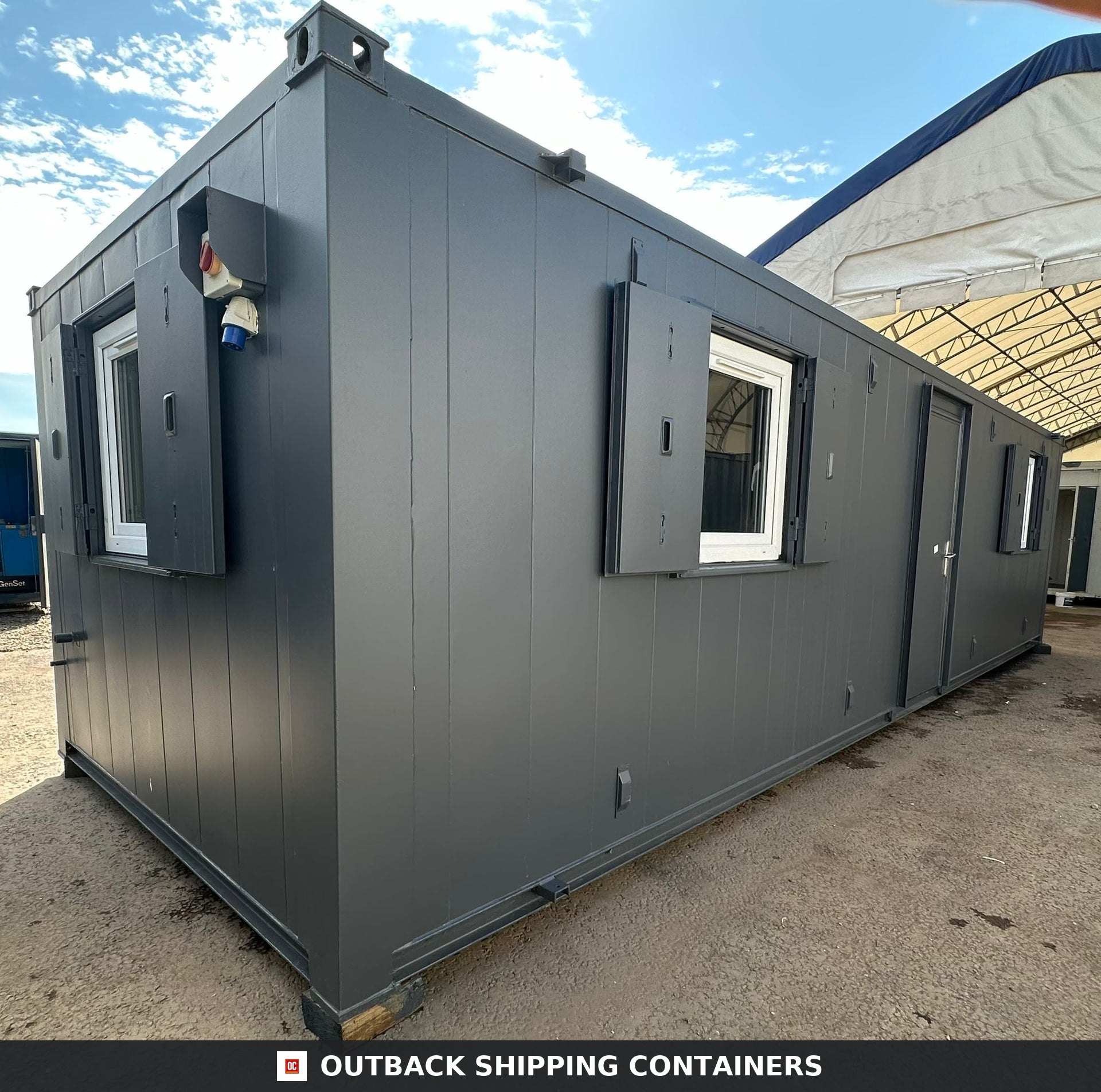 32x10ft Cabin for Sale — Roof and Structural Detail | Outback Shipping Containers 2 Refurbished 32x10ft anti-vandal shipping container office in dark gray with open steel shutters and white windows