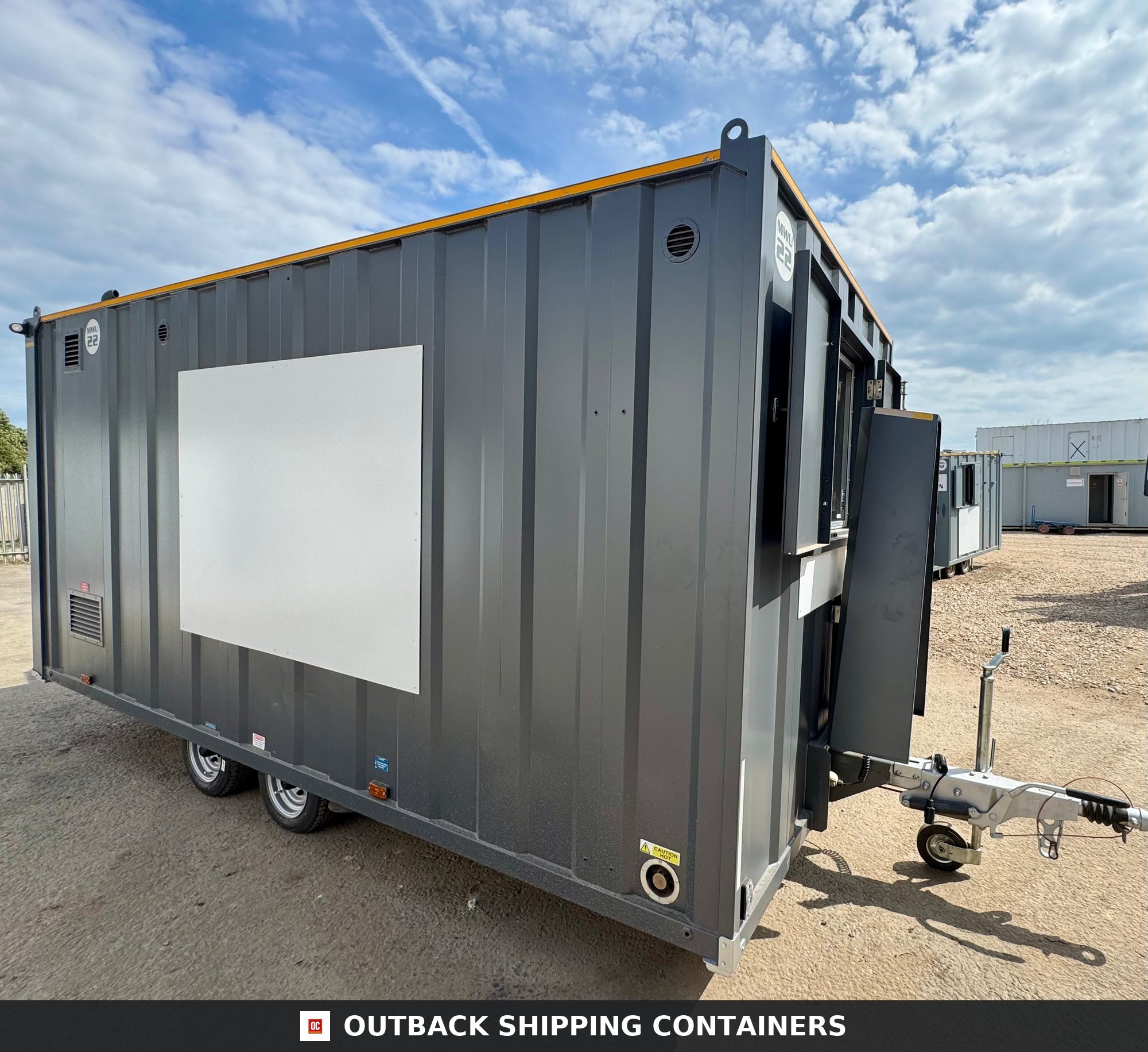 Groundhog Towable Mobile Welfare | 16 Ft | 2017 |Twin Axle | GPO500 — Interior Detail Gray 16ft Groundhog mobile welfare unit on a twin axle trailer with white signage panel against a blue sky