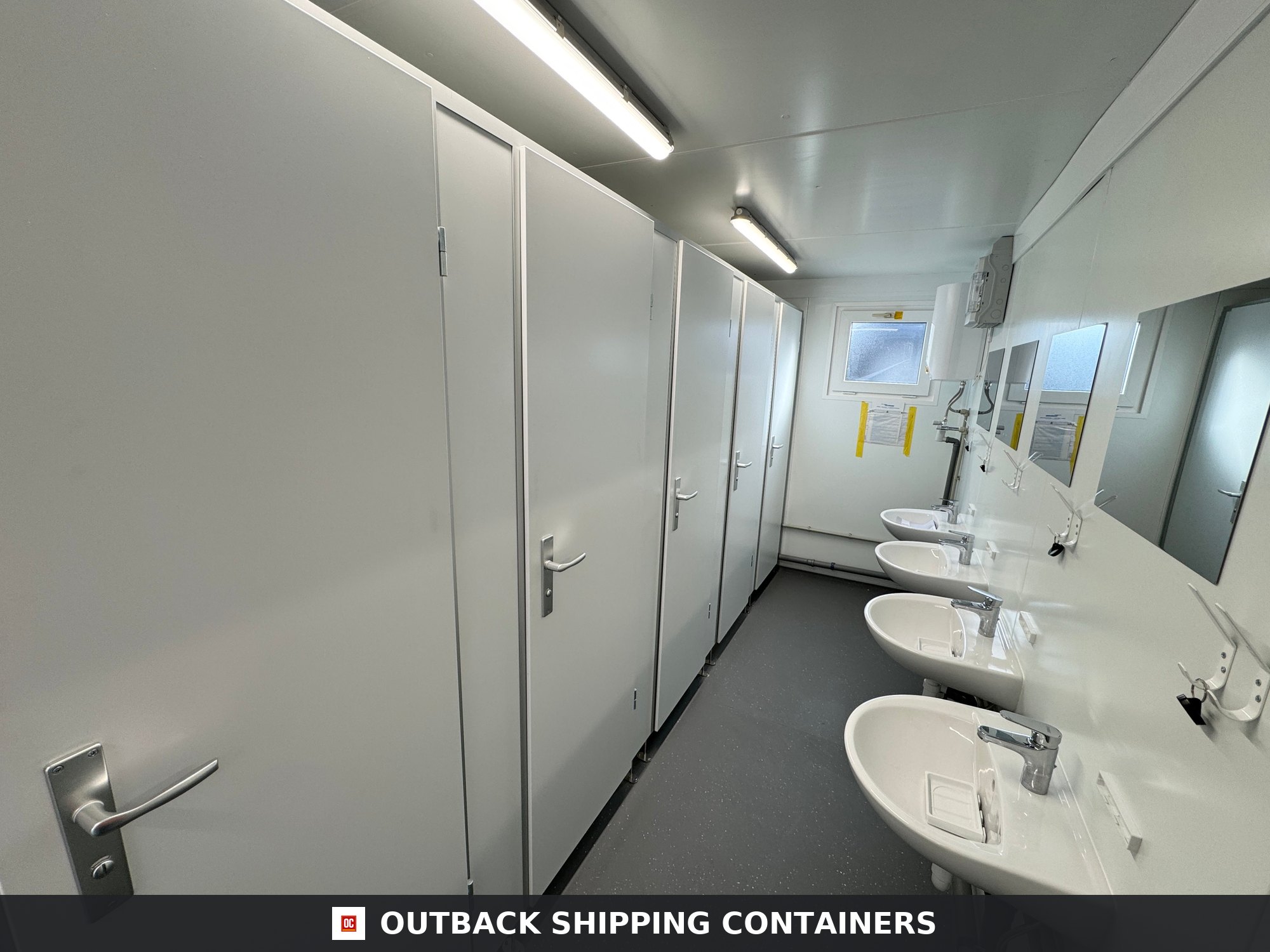 Toilet Block for Sale — Rear Exterior View | Outback Shipping Containers Toilet Block — 5 WC / 5 Basins / 4 Urinals — 20 x 8 ft NEW Portable — Grey — No 797 — product gallery image 4 of 19