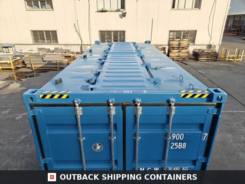 Top view of a blue 20ft bulk storage shipping container with loading hatches and locking bars