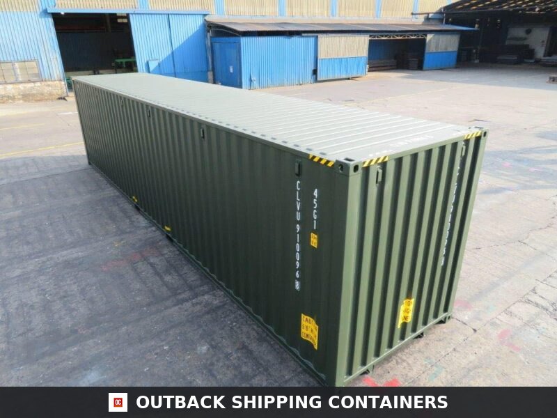 40 Ft New Shipping Containers Ready To Ship 40ft for Sale — Window and Shutter Detail 40ft olive green shipping container in a concrete yard with markings and yellow caution labels visible