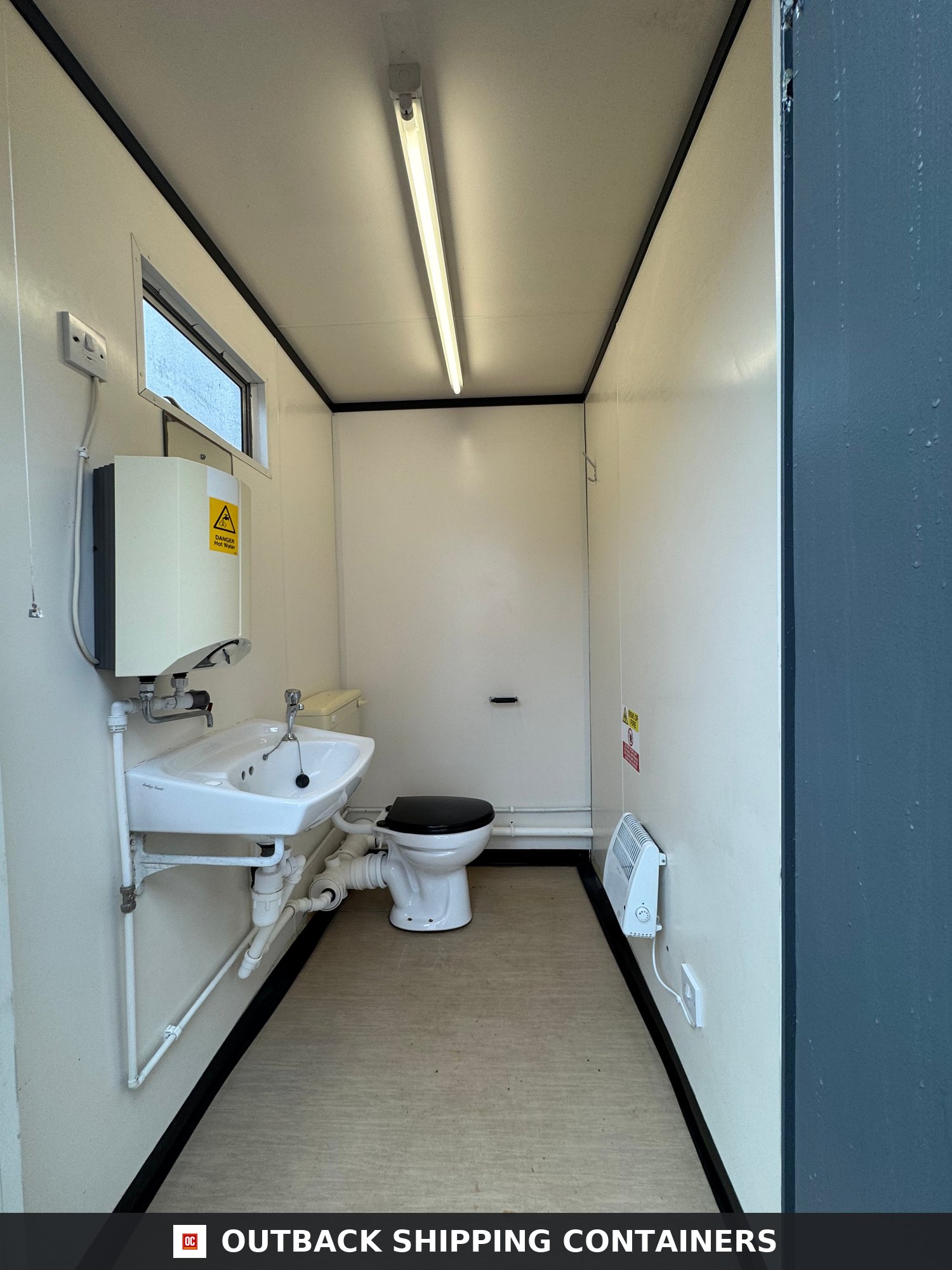 12 x 9 ft for Sale — Three-Quarter Angle View | Outback Shipping Containers 12 x 9 ft — 2+1 Toilet Block — Building Site Accommodation — Portable Anti-Vandal Cabin - image 2
