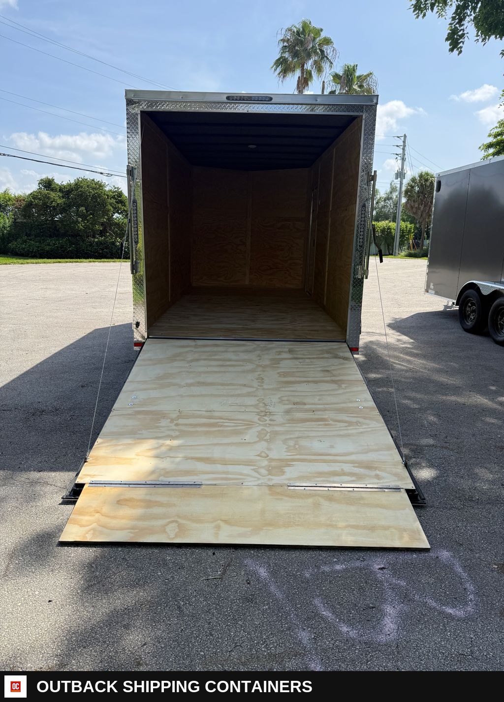 New 2027 Hook & Line 7 x 14 Enclosed Trailer 7k GVWR — Three-Quarter Front Angle | Outback Shipping Containers New 2027 Hook & Line 7 x 14 Enclosed Trailer 7k GVWR for sale — three-quarter front angle