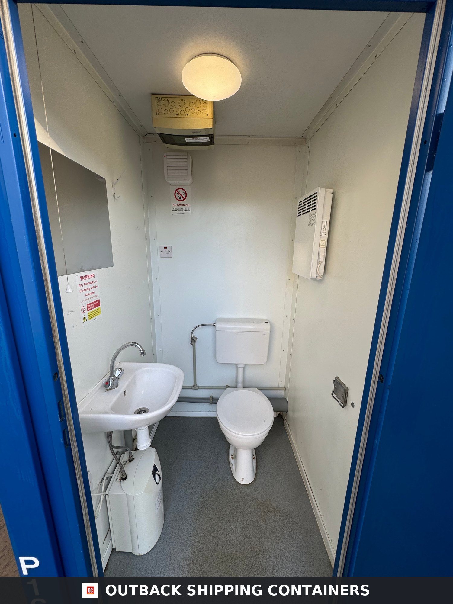 Double Toilet Blocks for Sale — Three-Quarter Angle View | Outback Shipping Containers 2 Double Toilet Blocks — Male Female WC — 8x5 Ft — Unrefurbished Portable Toilet Block 1+1 Toilet Blocks — Blue - image 2