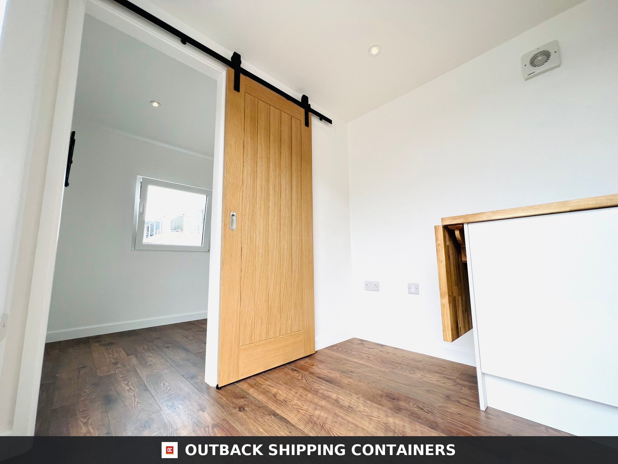 20x8 ft Shipping Container House / Annex Conversion 20X8FT for Sale — Rear Exterior View CD-OBB-20 20x8 ft Shipping Container House / Annex Conversion — Contai — angle 4